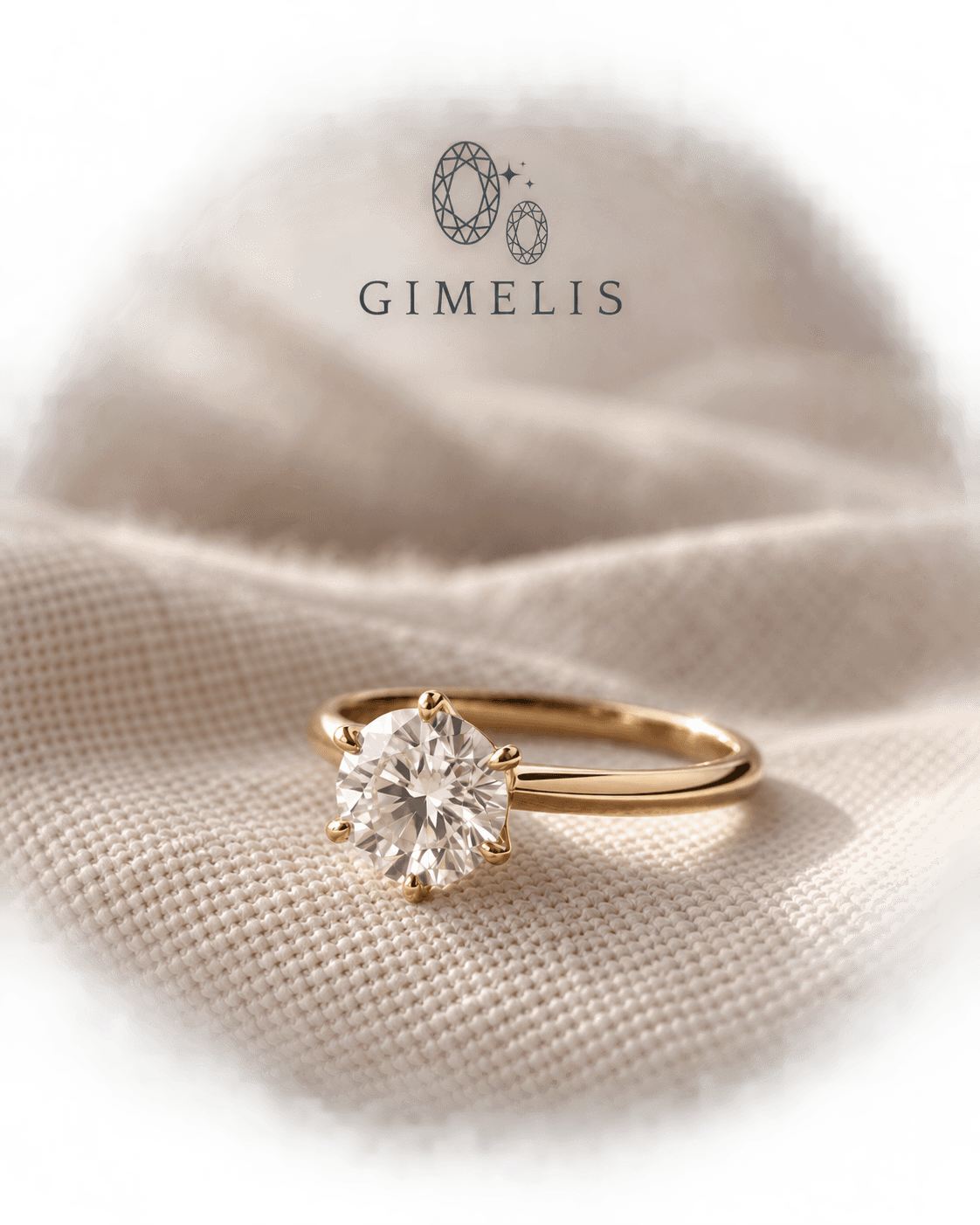 Gold six-prong solitaire diamond ring resting on linen