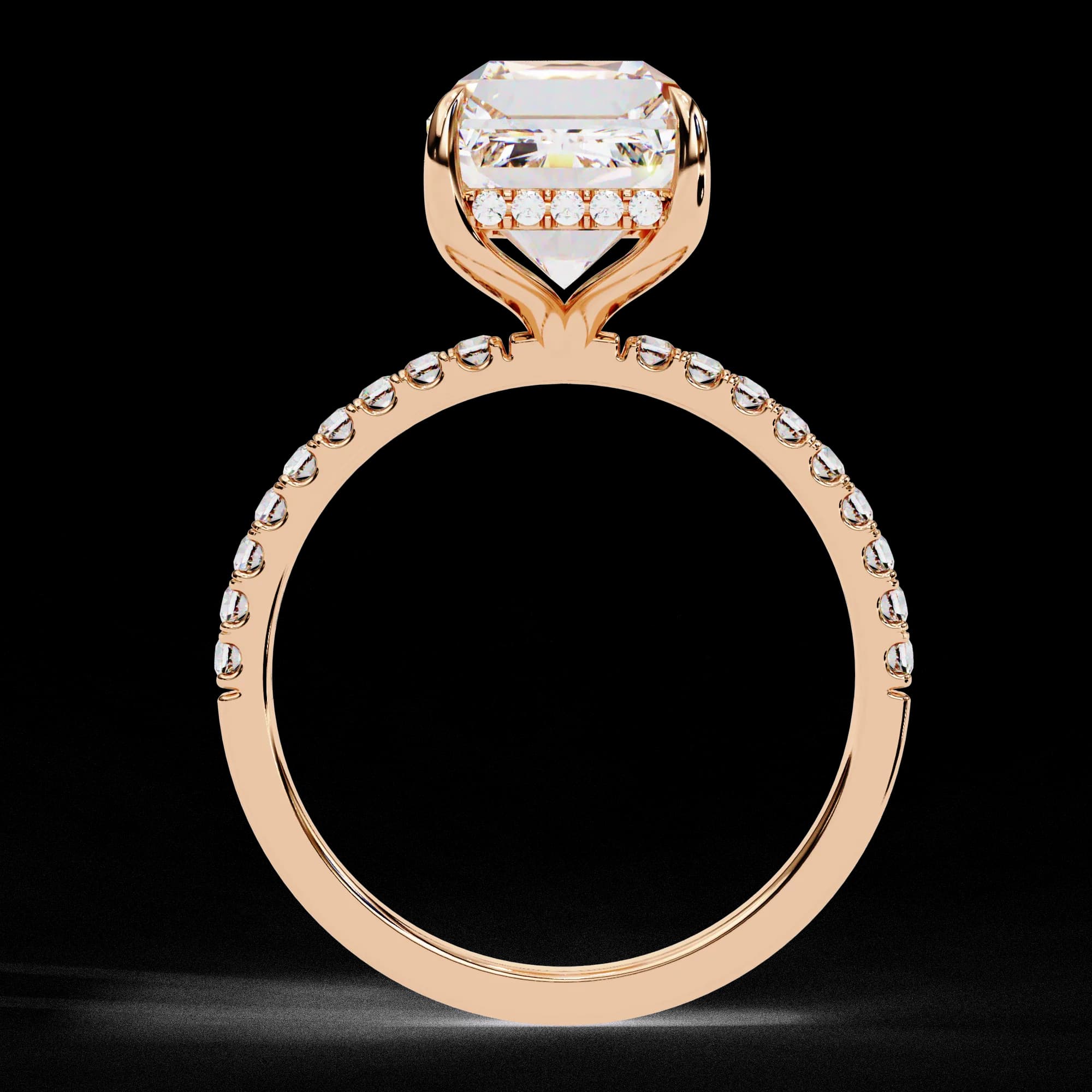 Through-finger view showing the hidden halo in rose gold