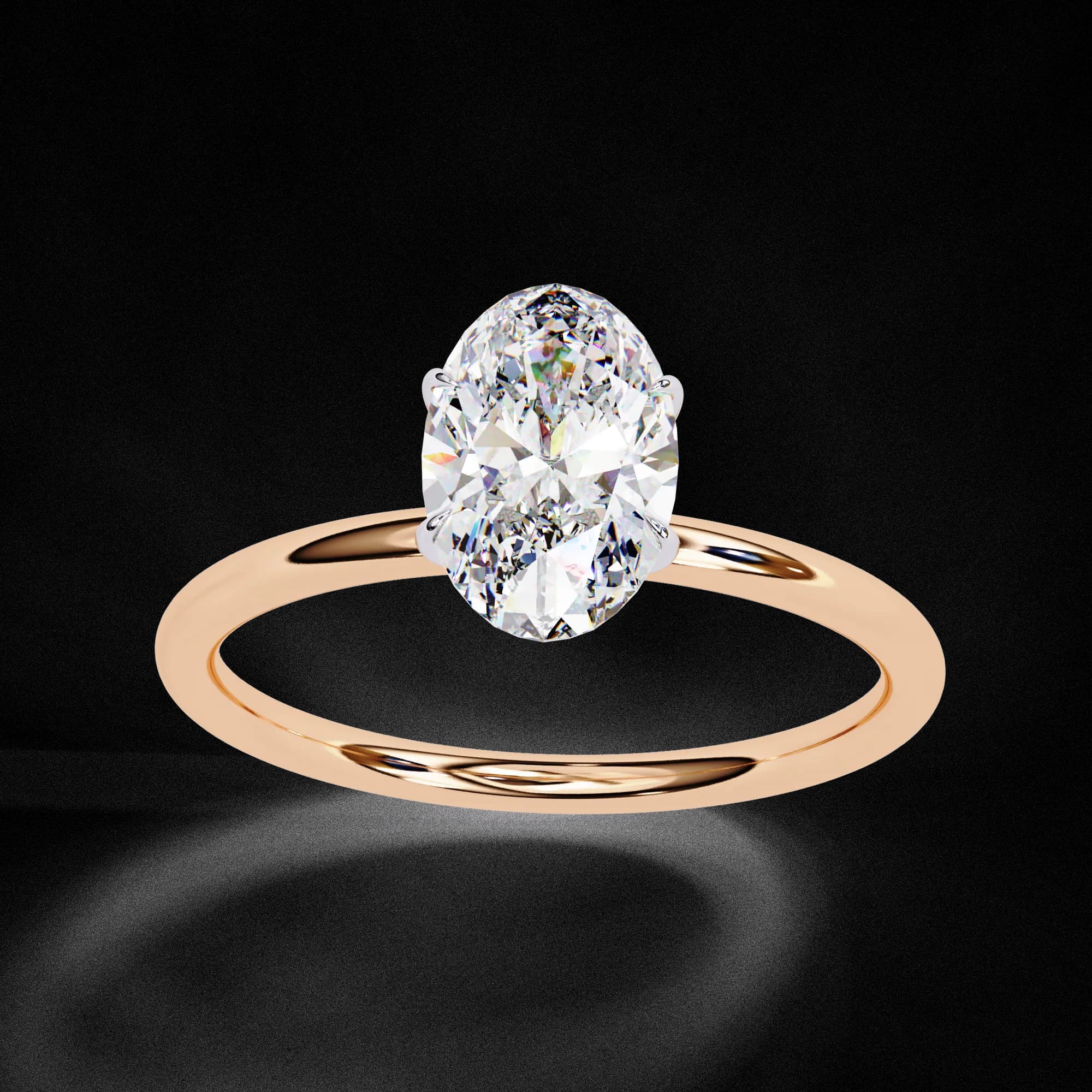 Oval lab grown diamond slim band solitaire engagement ring in rose gold, three-quarter view