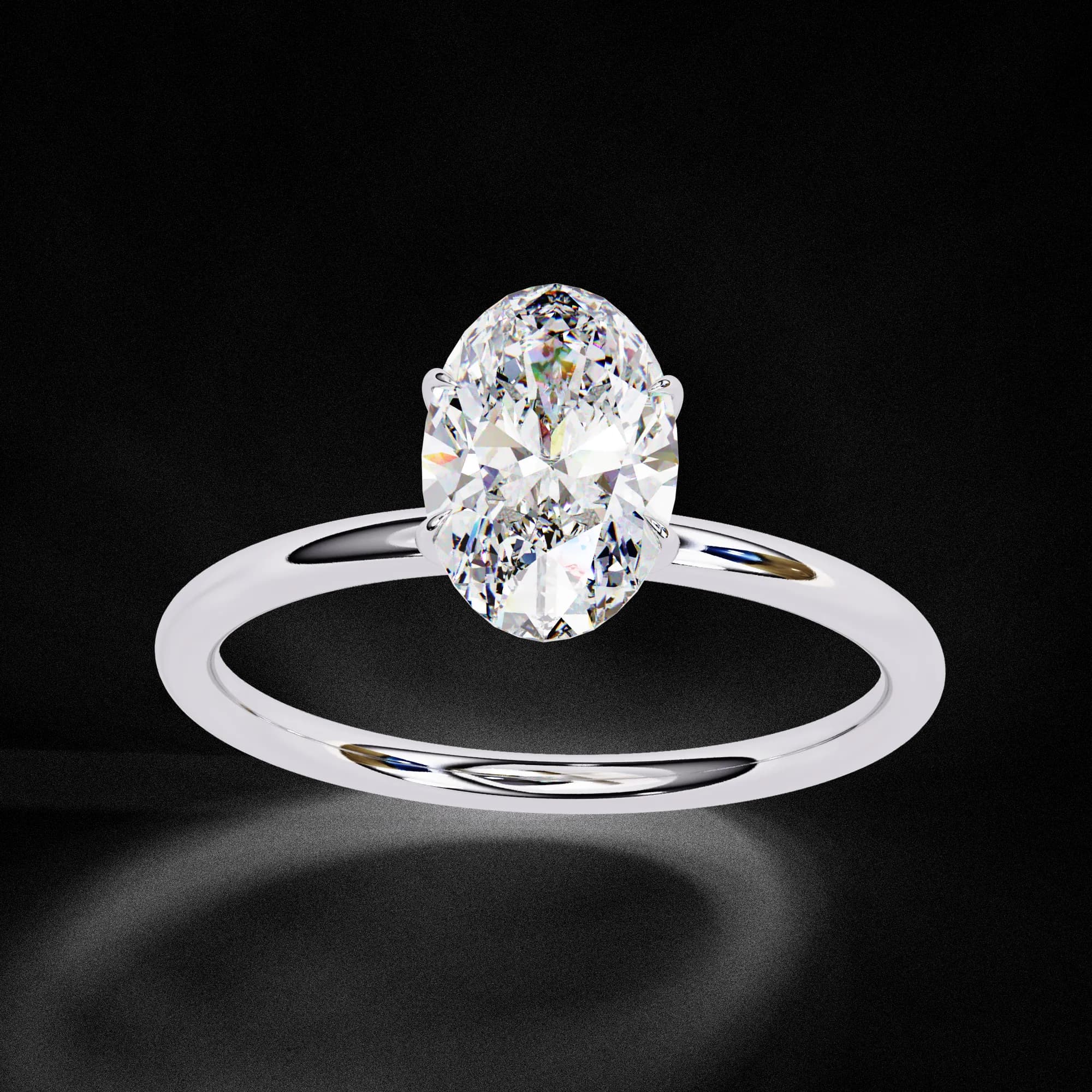 Oval lab grown diamond slim band solitaire engagement ring in white gold, three-quarter view