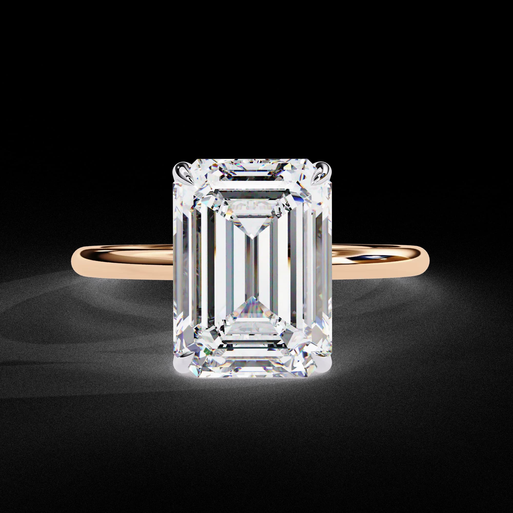 Emerald cut lab grown diamond four-claw solitaire engagement ring in rose gold, front view
