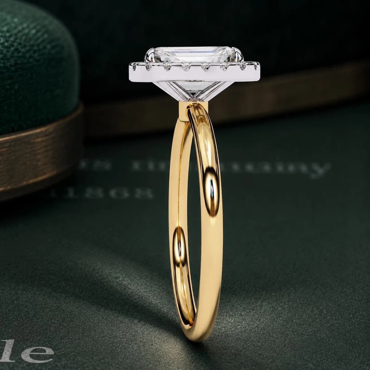 Radiant cut lab grown diamond halo engagement ring in yellow gold on green velvet, side view