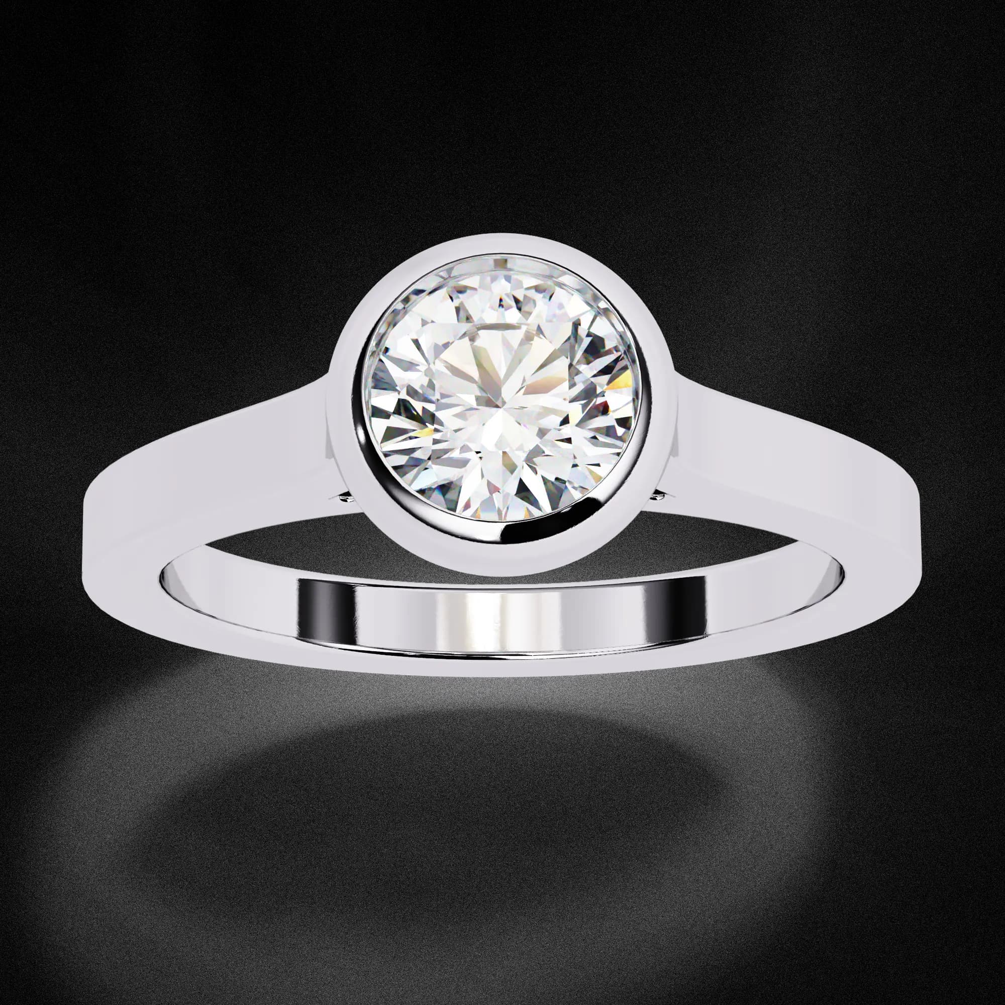 Round lab grown diamond bezel set solitaire engagement ring in white gold, three-quarter view