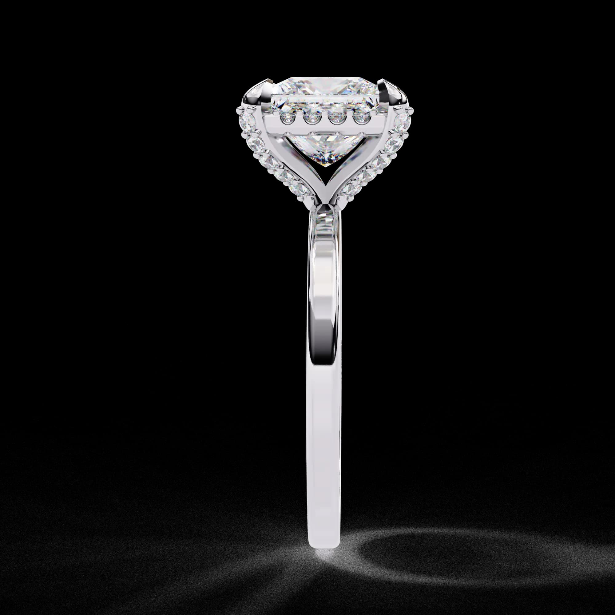 Princess cut lab grown diamond low halo engagement ring in white gold, side profile view
