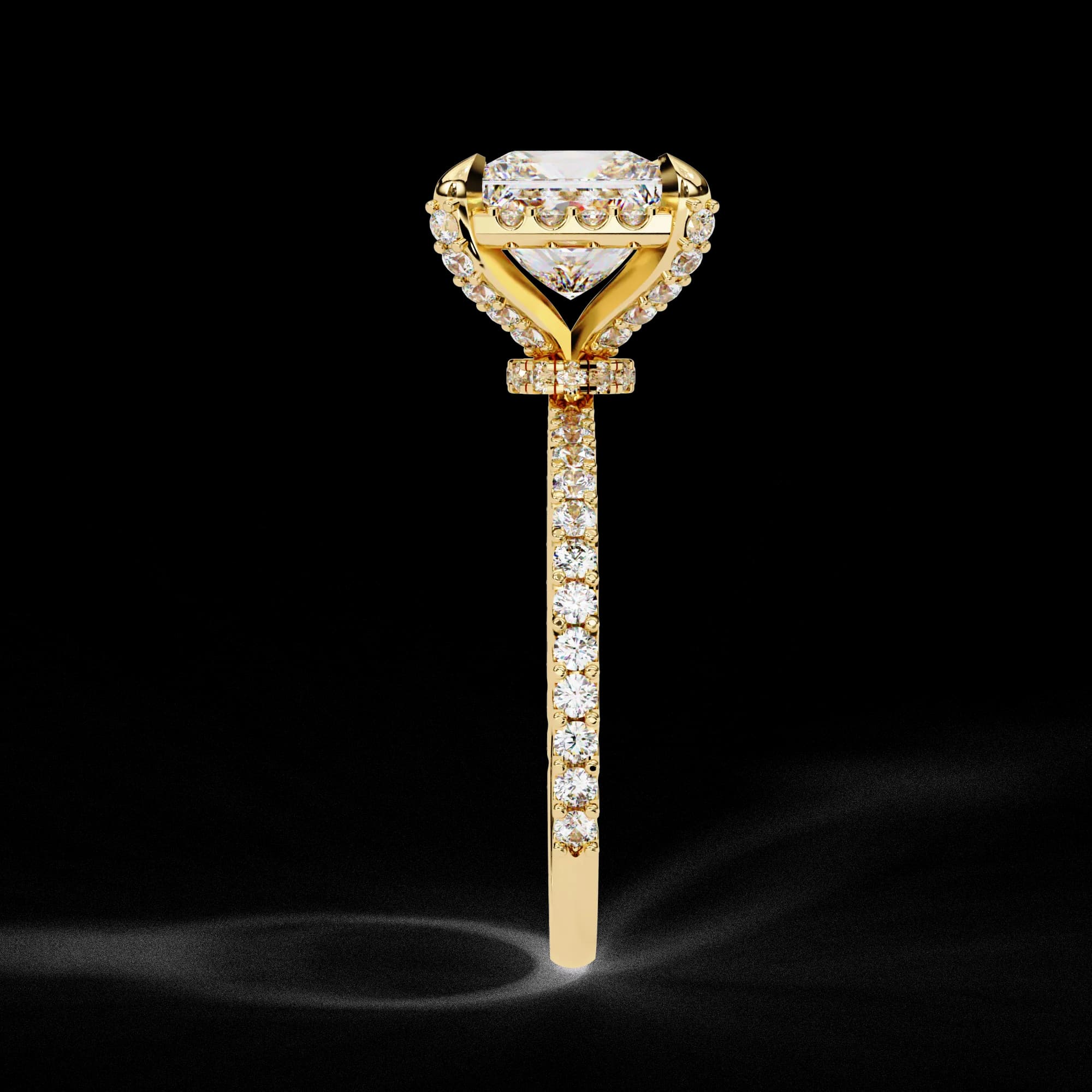 Princess cut lab grown diamond halo engagement ring in yellow gold, side profile view