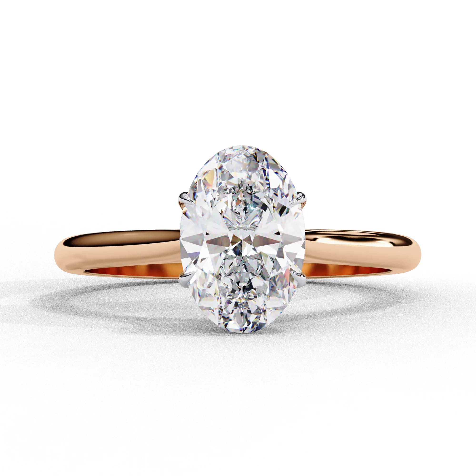 Oval lab grown diamond four-claw solitaire engagement ring in rose gold, front view