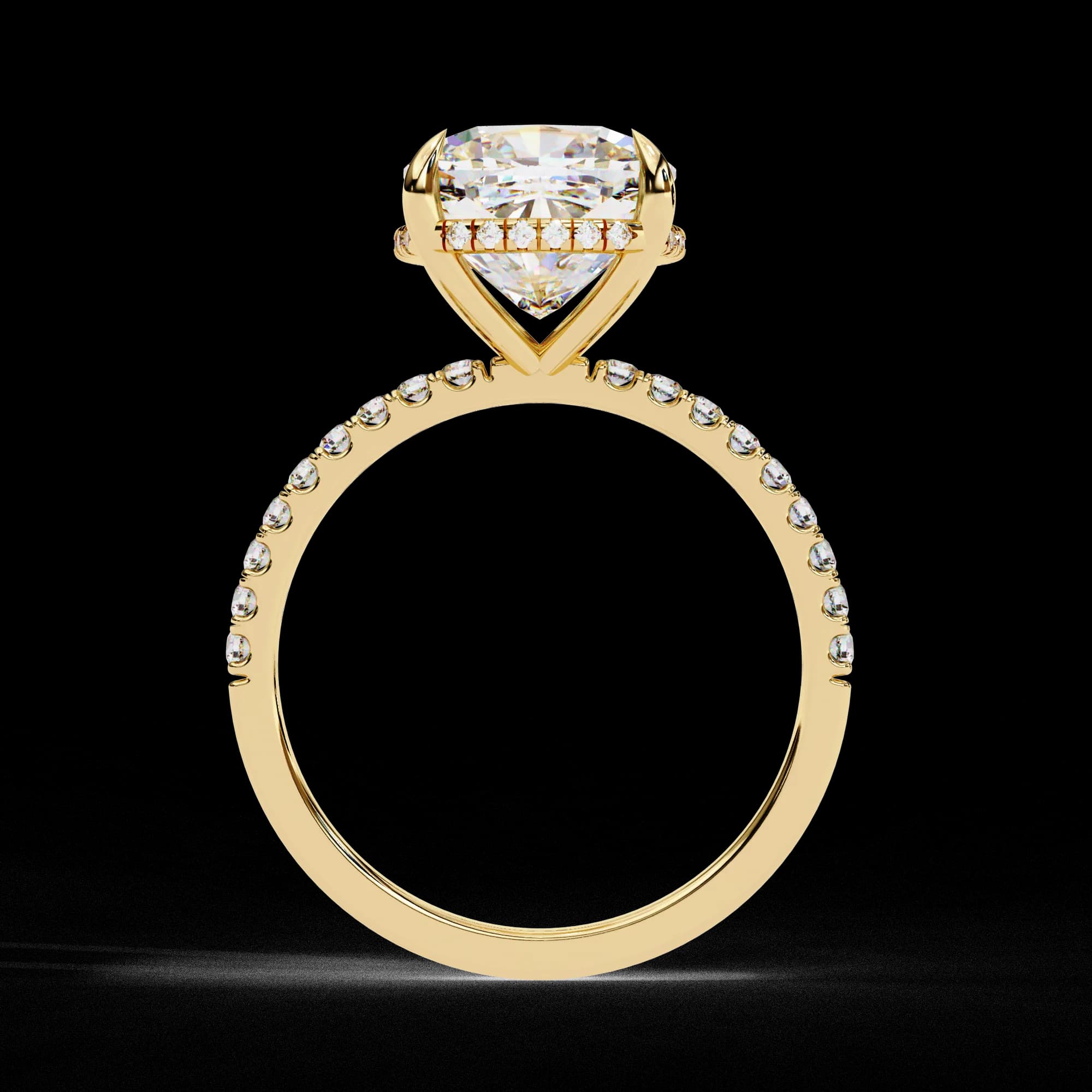 Cushion cut lab grown diamond hidden halo engagement ring in yellow gold, through-finger view
