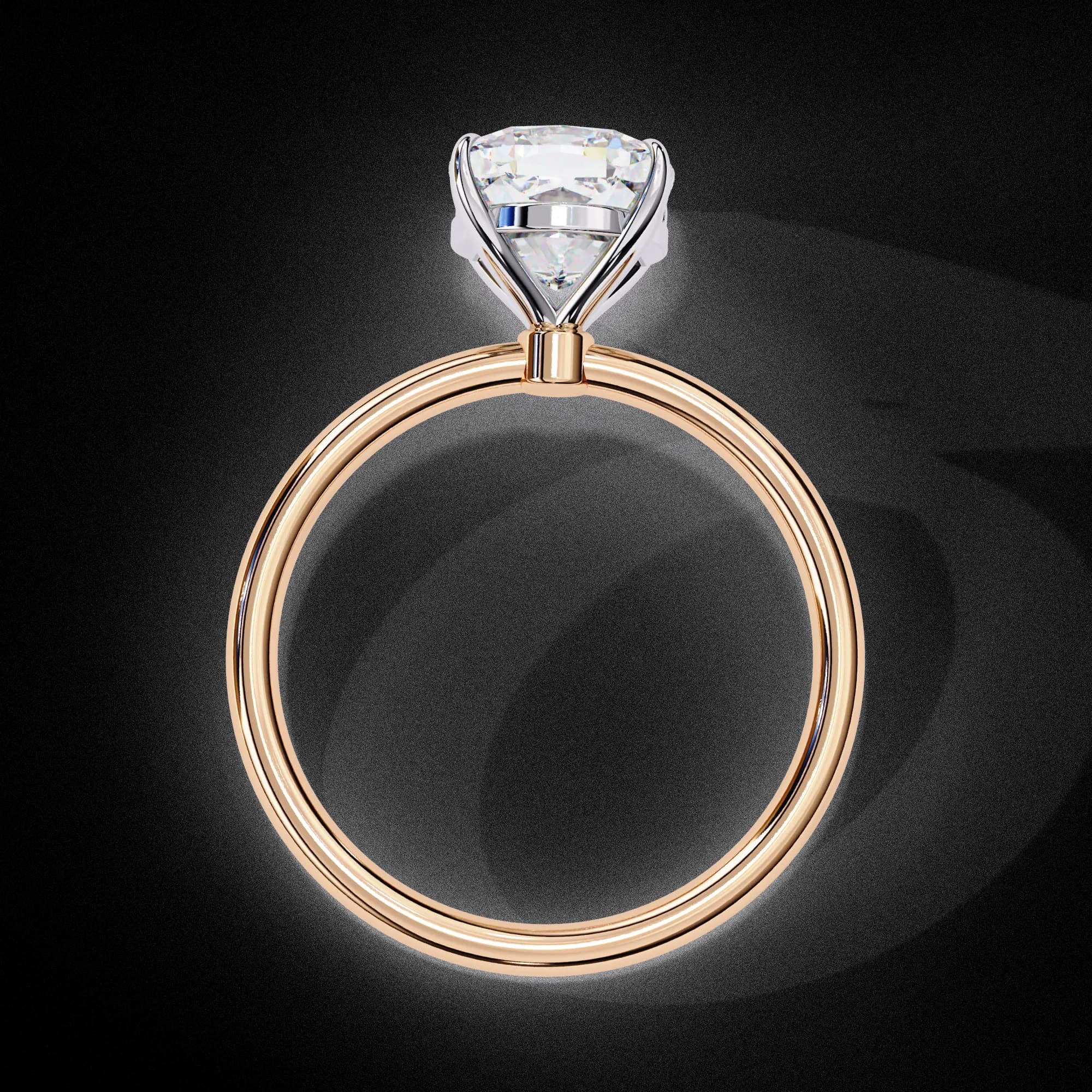 Cushion cut lab grown diamond four-claw solitaire engagement ring in rose gold, through-finger view