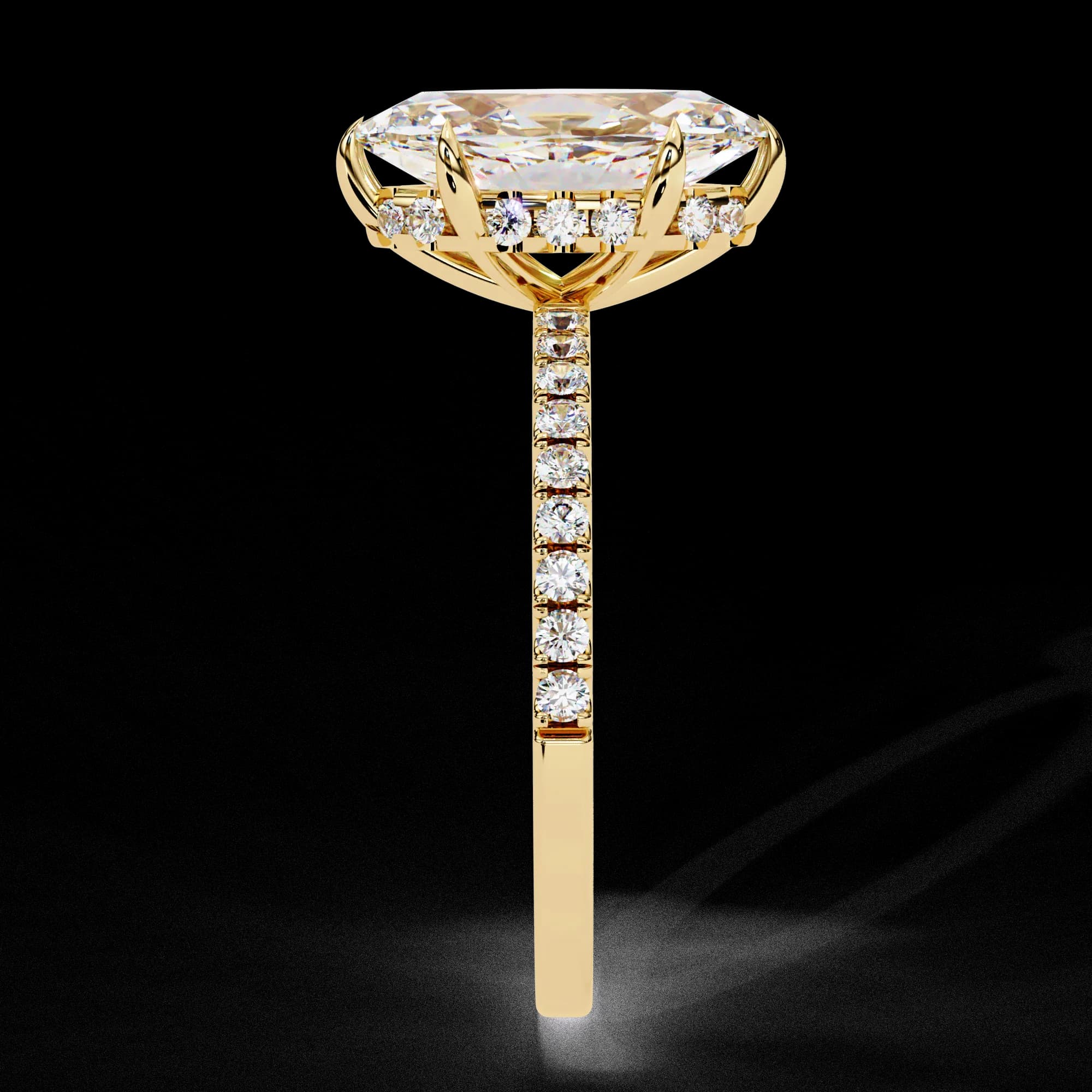 Marquise cut lab grown diamond hidden halo engagement ring with pavé band in yellow gold, side profile view