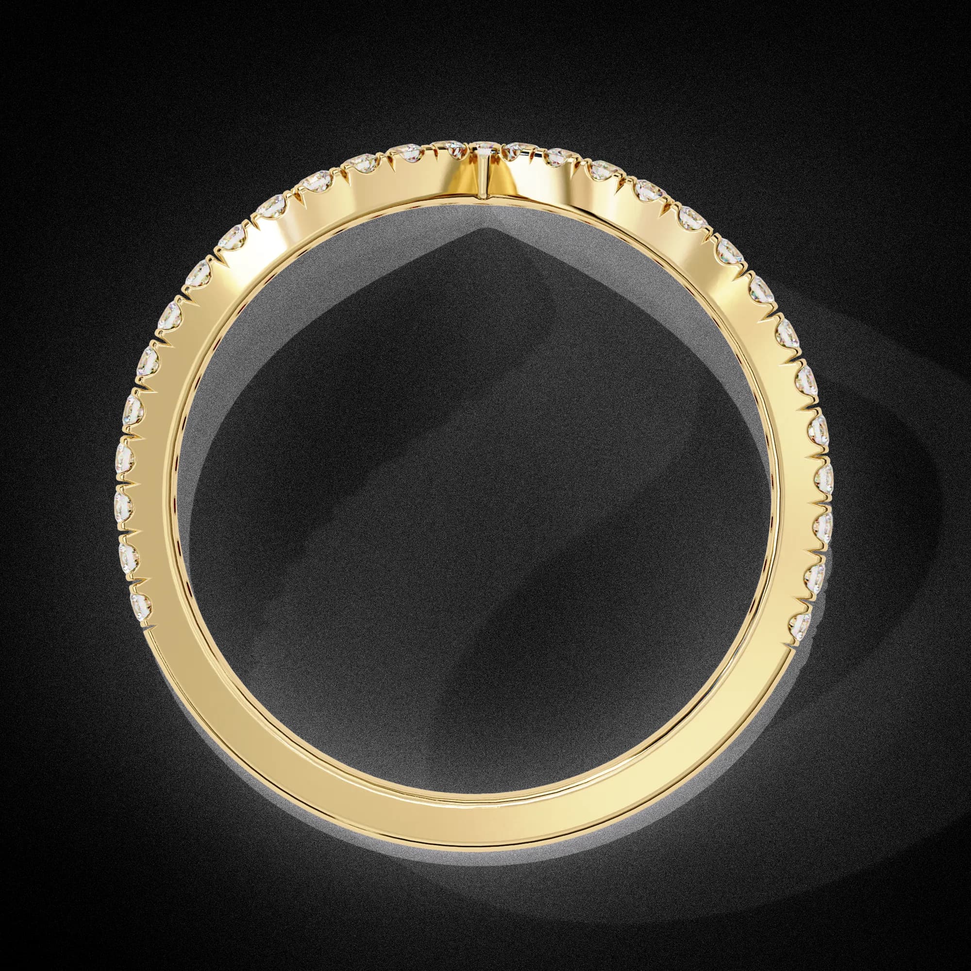 Round lab grown diamond chevron pavé wedding band in yellow gold, through-finger view
