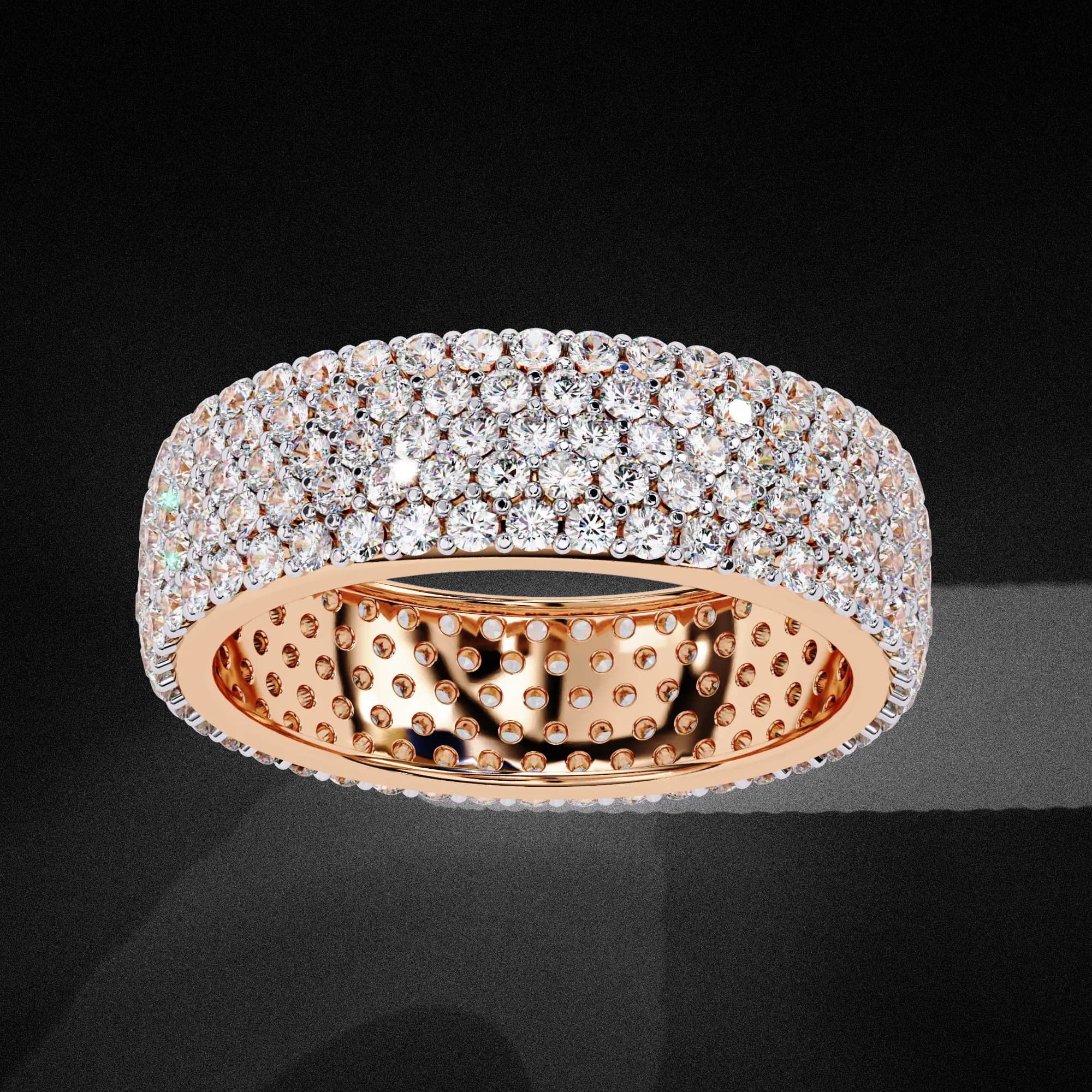 Round lab grown diamond wide multi-row pavé eternity band in rose gold, angled view