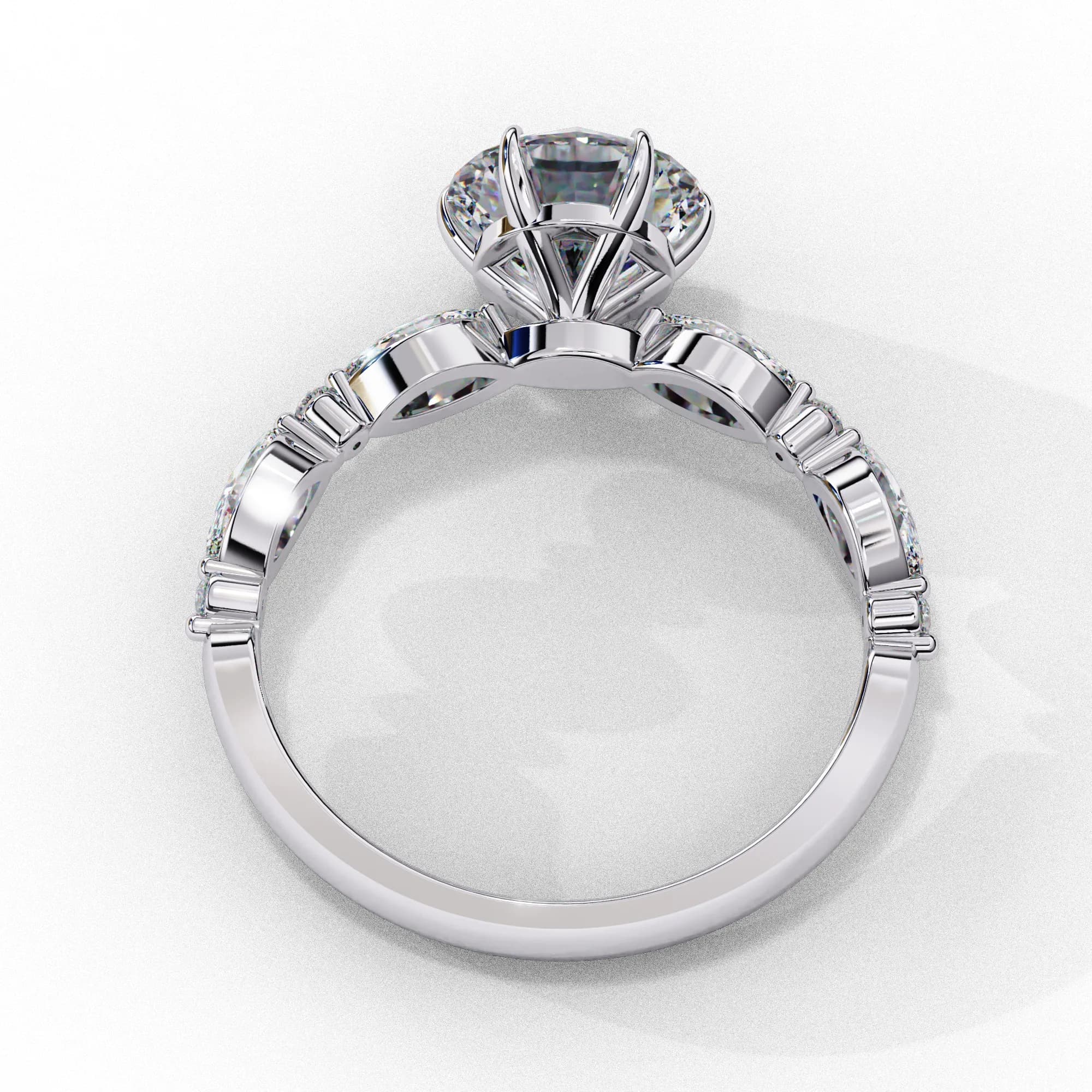 Round lab grown diamond engagement ring with marquise side stones in white gold, through-finger view