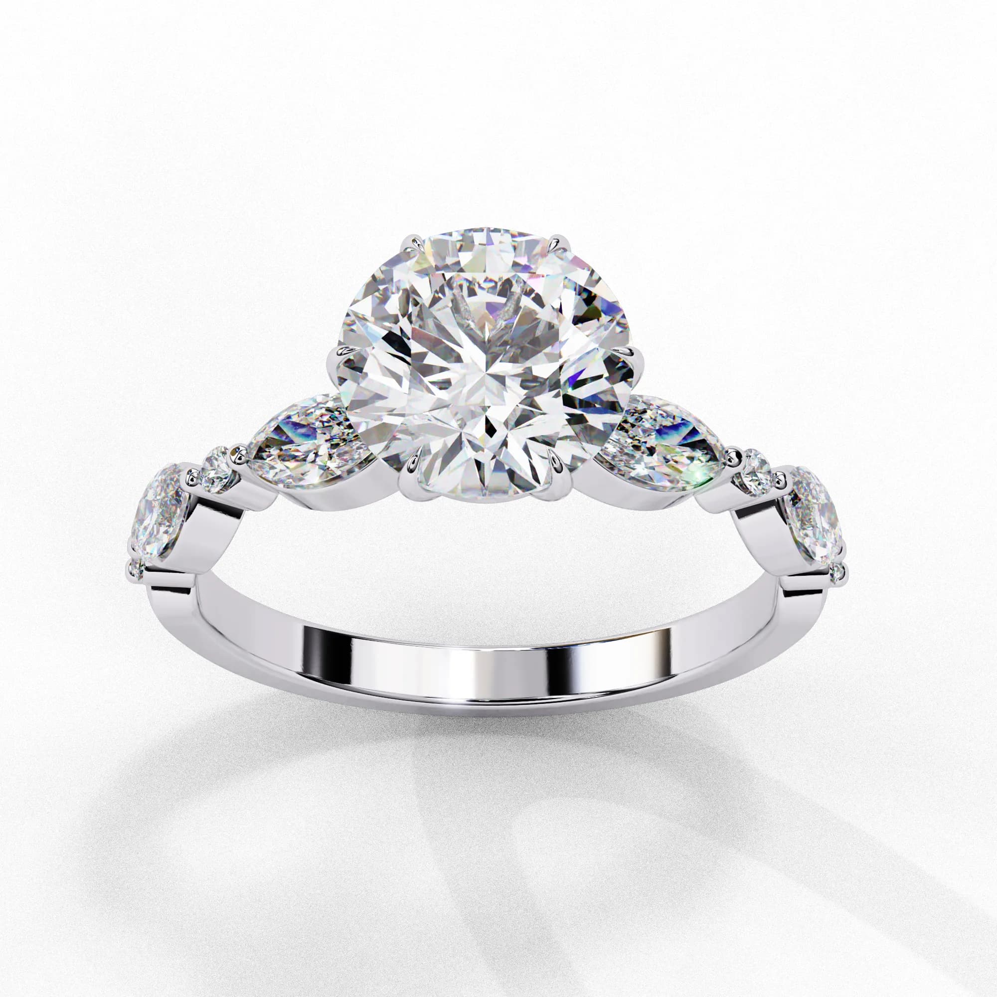 Round lab grown diamond engagement ring with marquise side stones in white gold, angled view