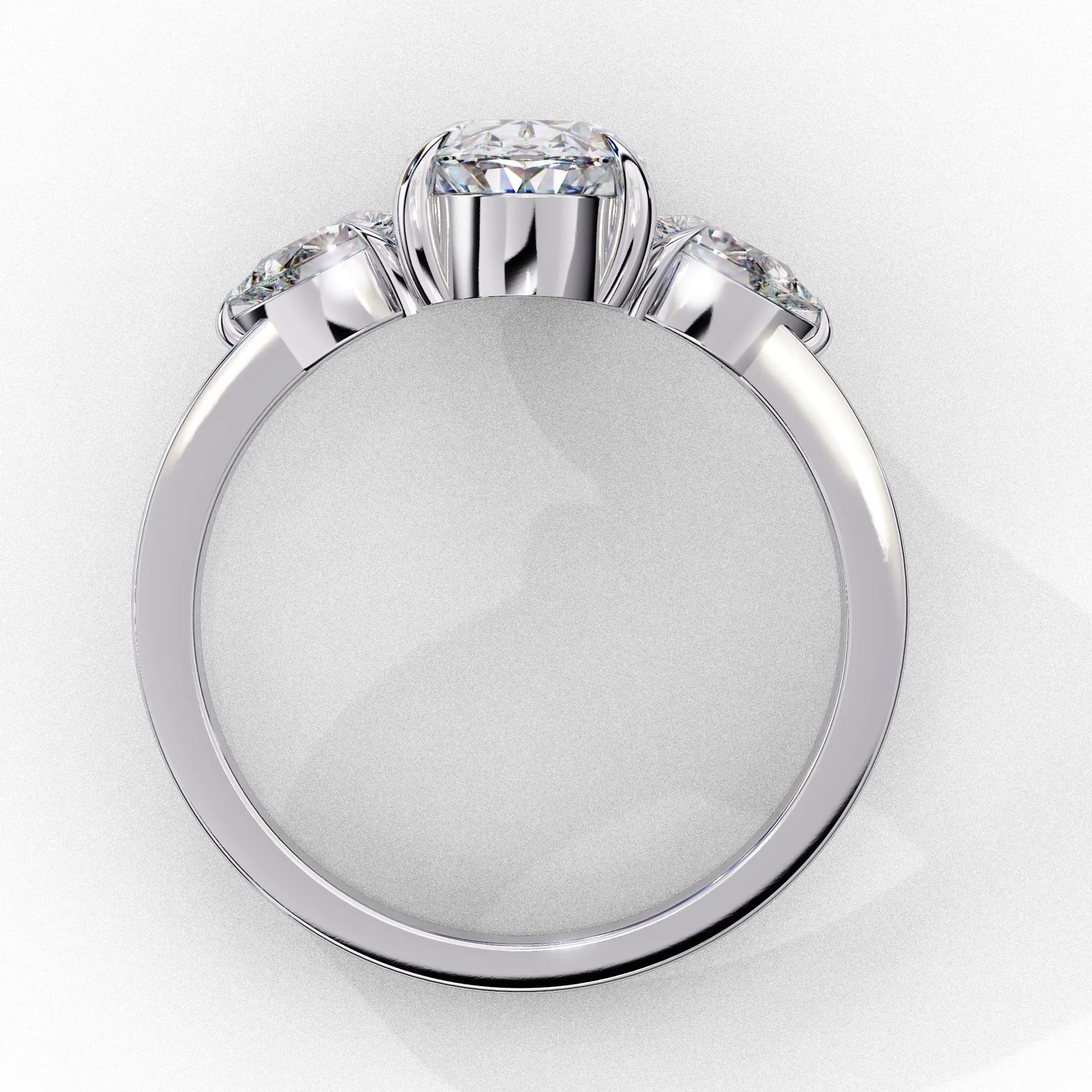 Oval lab grown diamond three-stone engagement ring with pear side stones in white gold, through-finger view