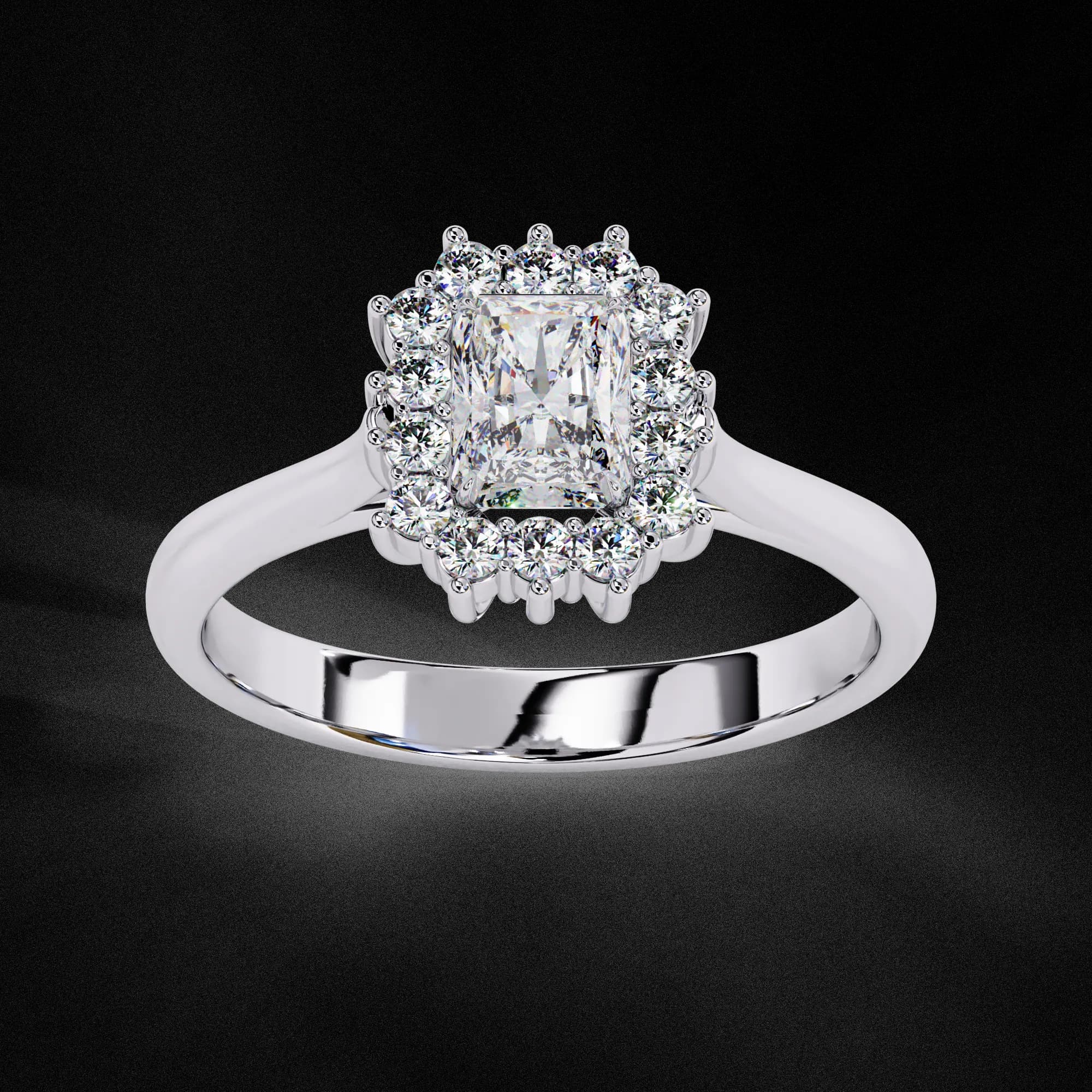 Radiant cut lab grown diamond cluster halo engagement ring in white gold, three-quarter view