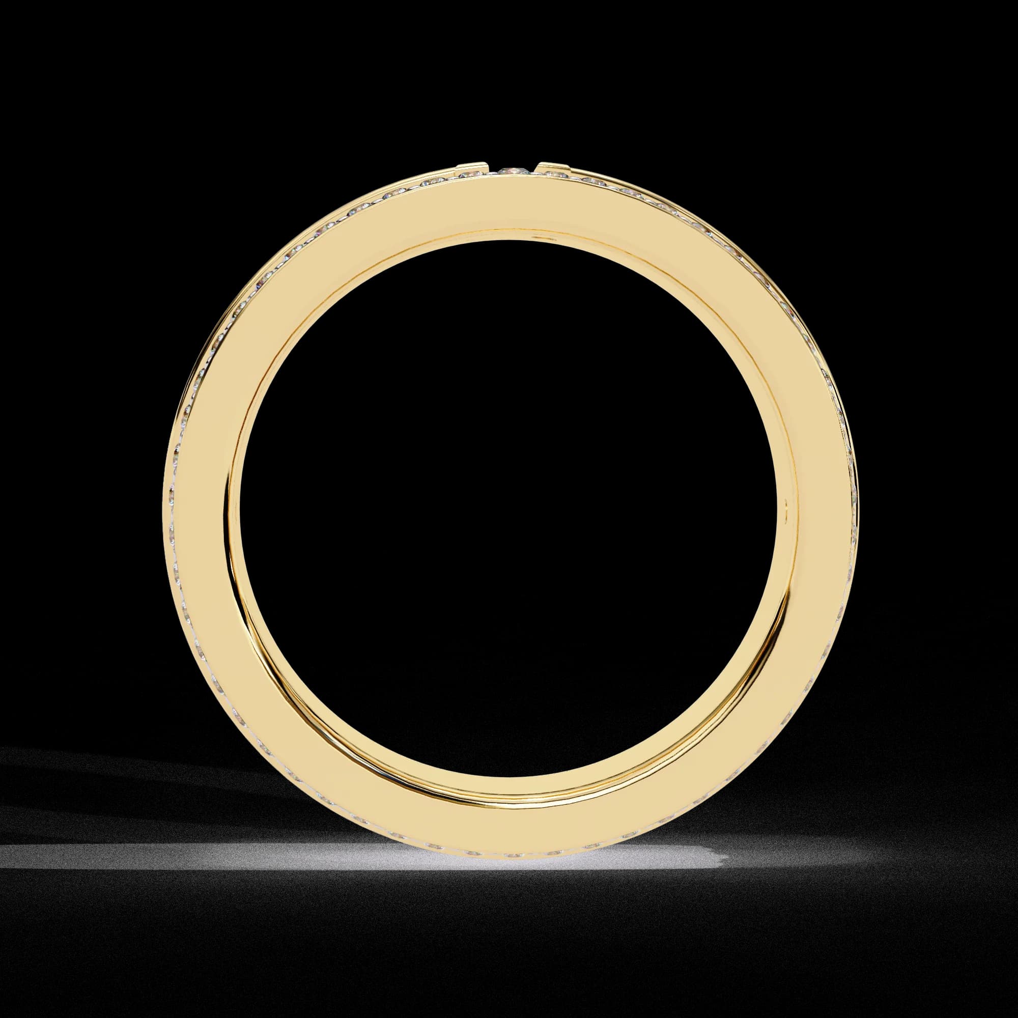 Wide four-row pavé lab grown diamond eternity band in yellow gold, through-finger view