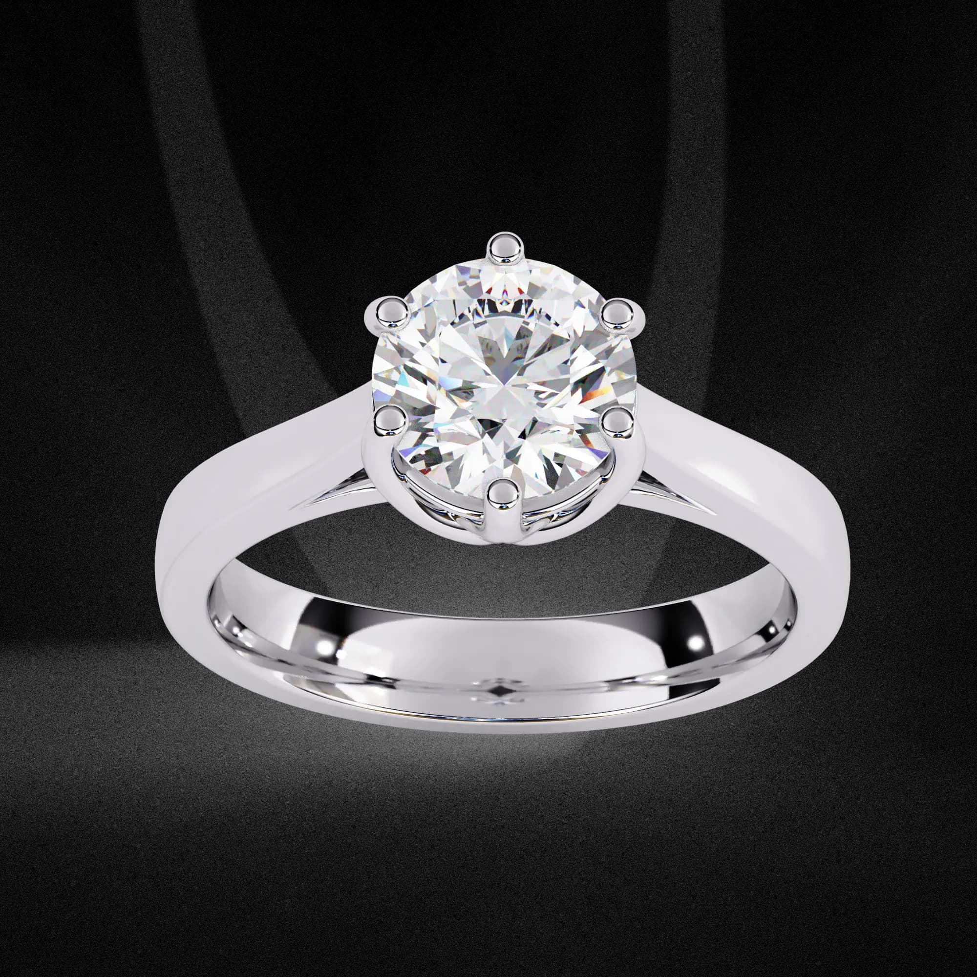 Round lab grown diamond six-claw solitaire engagement ring in white gold, angled view