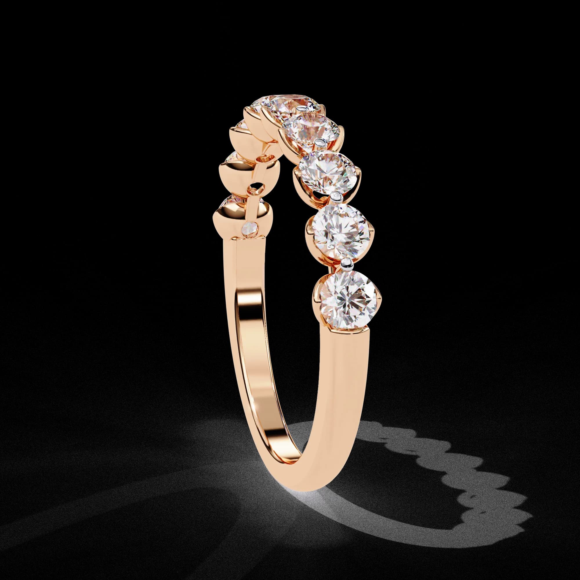 Round lab grown diamond half eternity wedding band in rose gold, side profile view