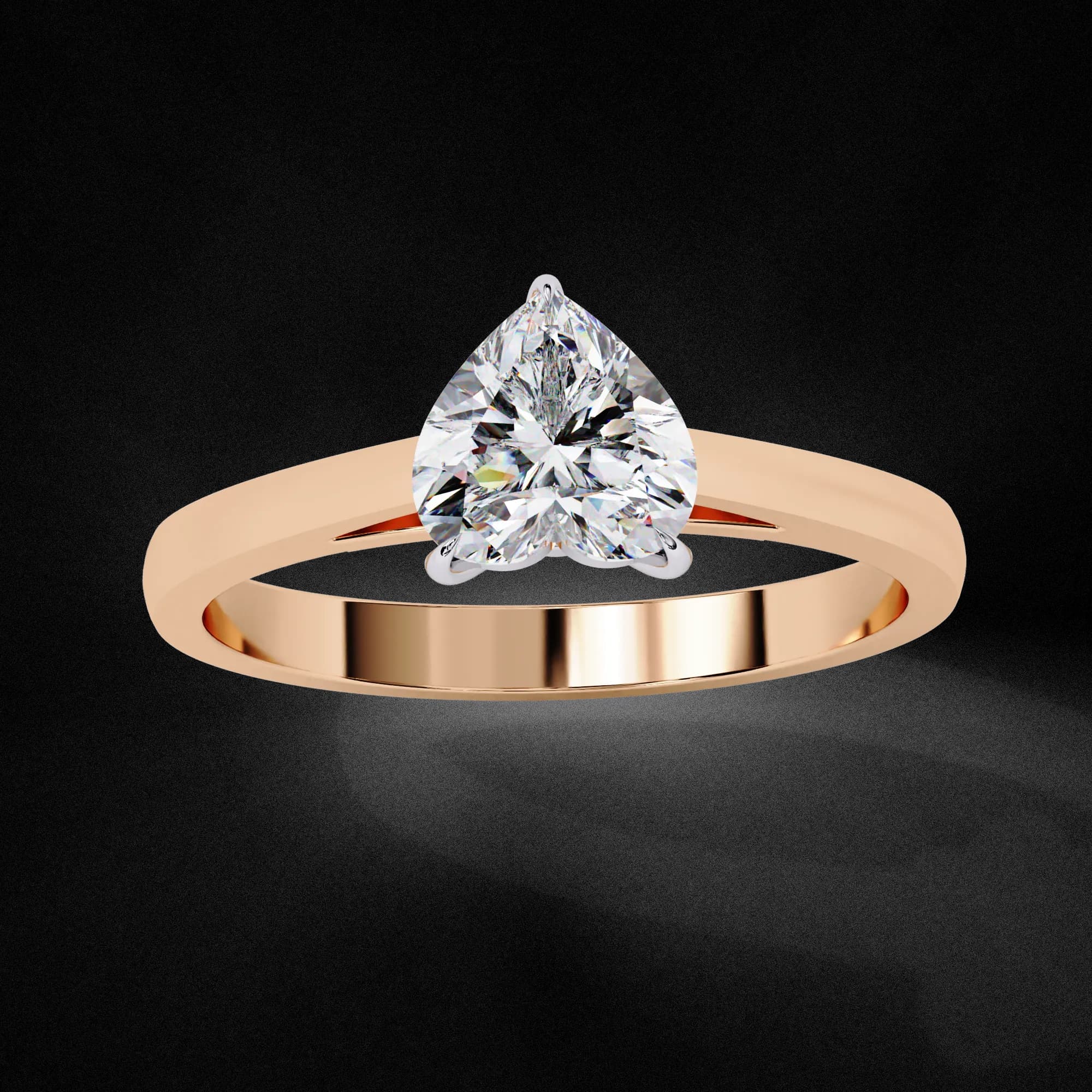 Heart shaped lab grown diamond cathedral solitaire engagement ring in rose gold, angled view