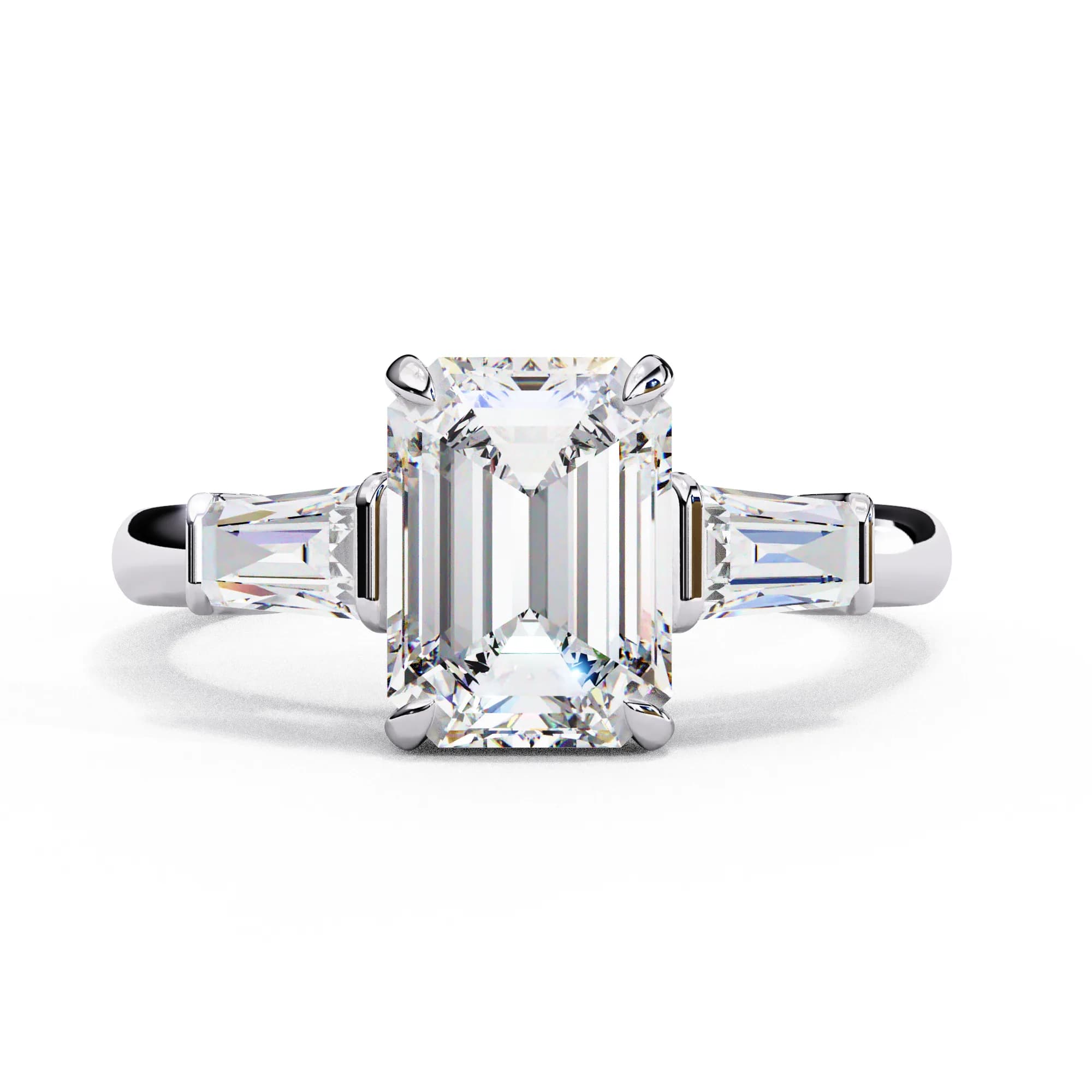 Emerald cut lab grown diamond three-stone engagement ring with baguettes in white gold, front view