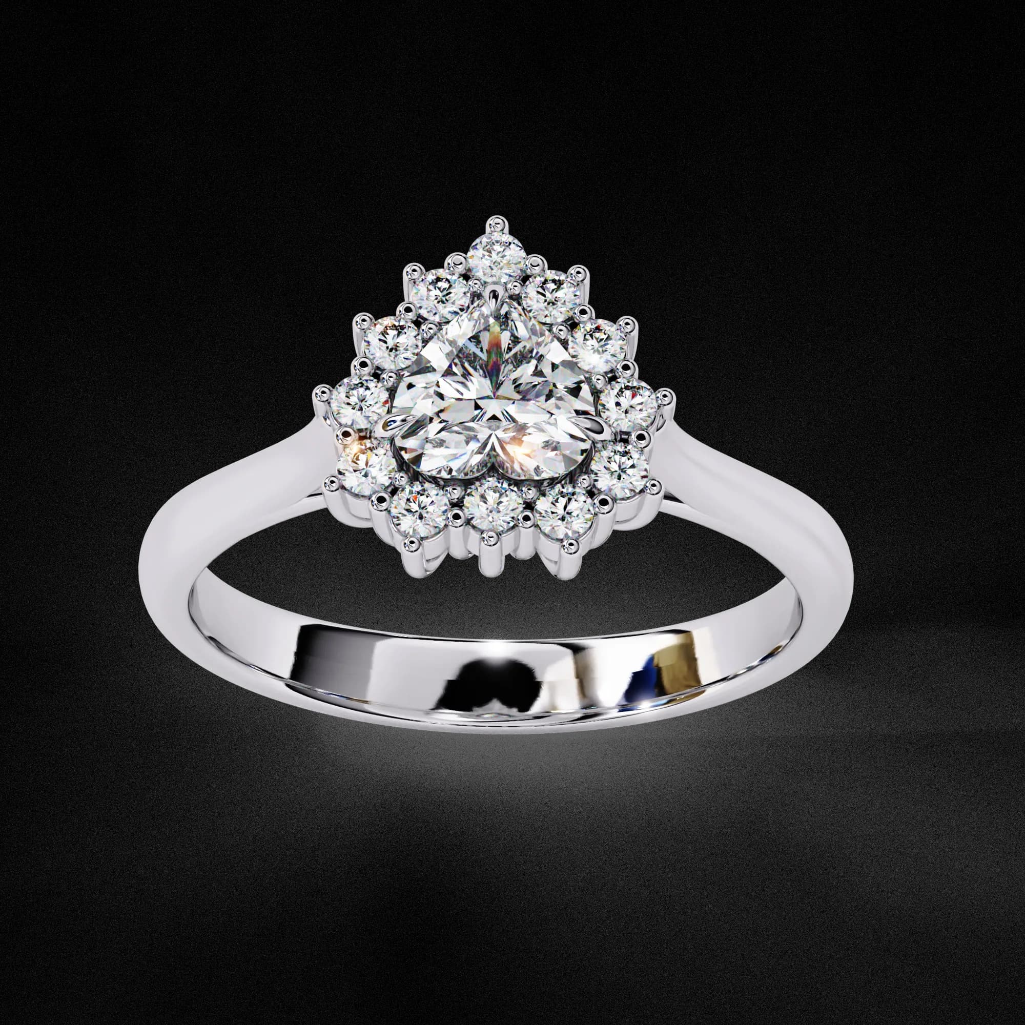 Heart shaped lab grown diamond cluster halo engagement ring in white gold, angled view