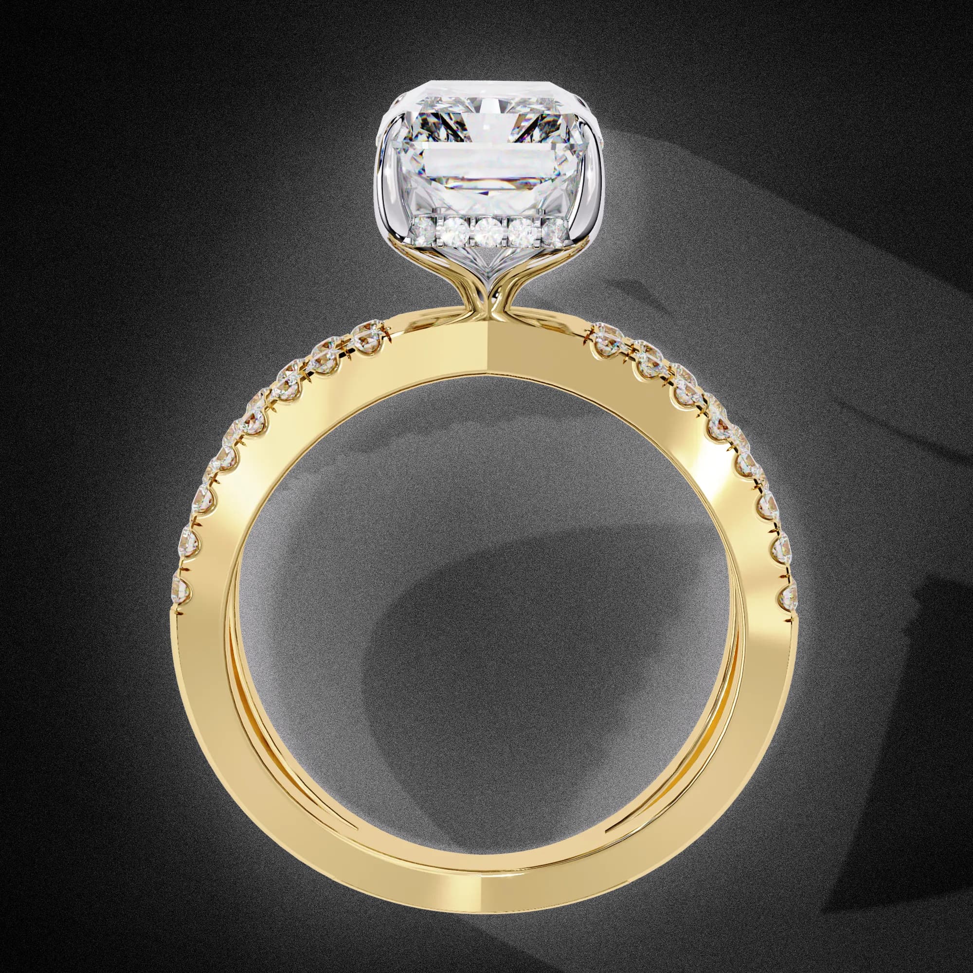 Emerald cut lab grown diamond crossover split shank engagement ring in yellow gold, through-finger view