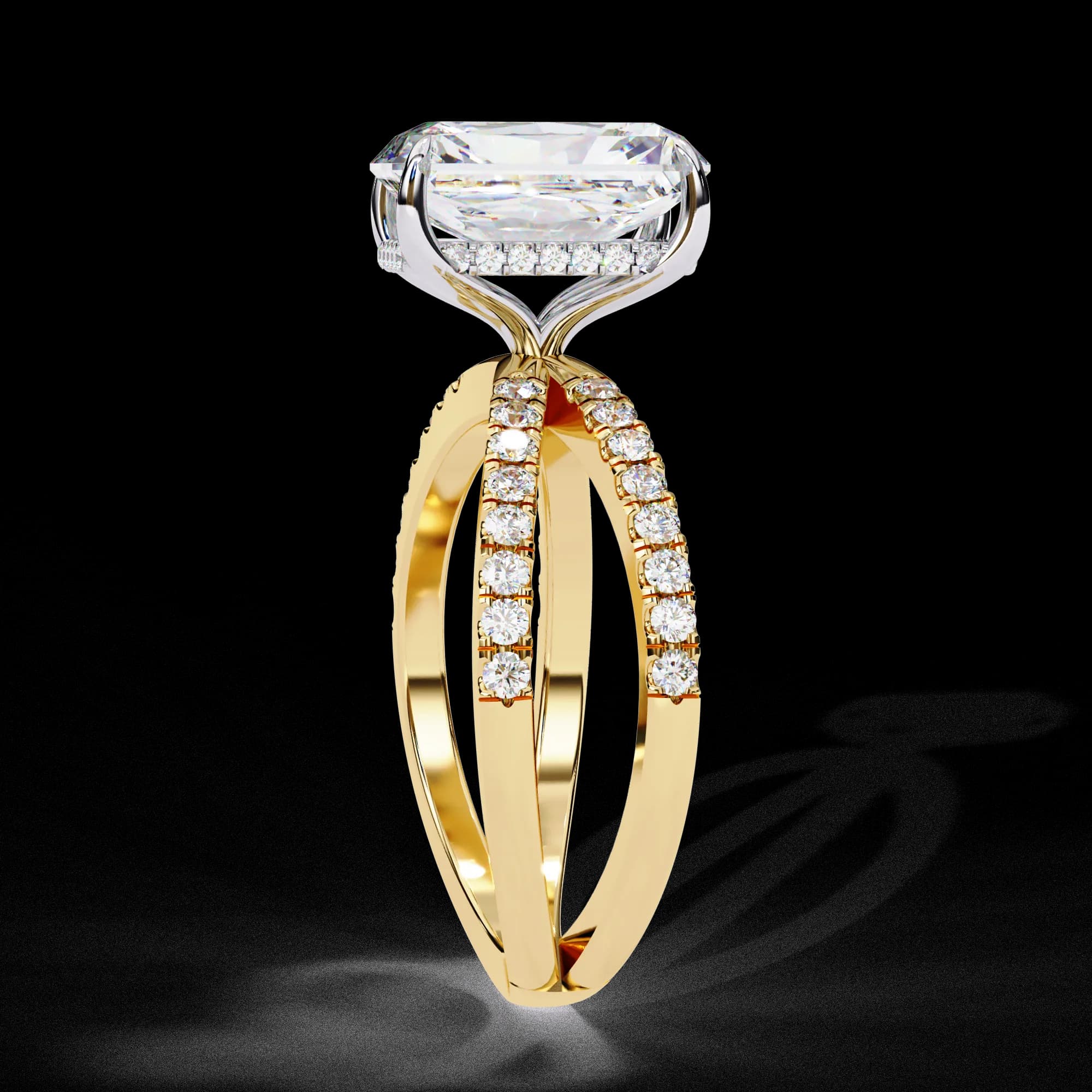 Emerald cut lab grown diamond crossover split shank engagement ring in yellow gold, side profile view
