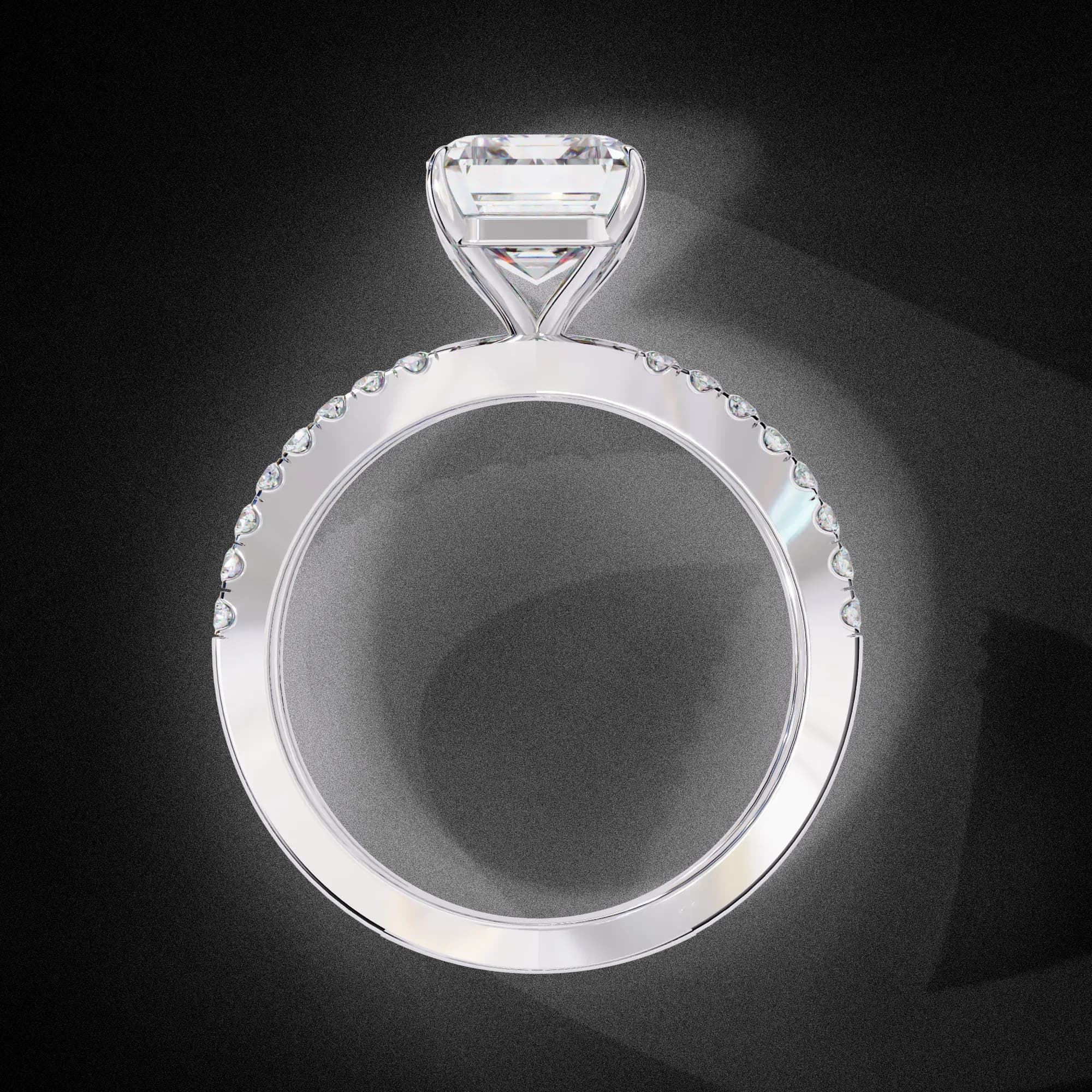Emerald cut lab grown diamond criss-cross split shank engagement ring in white gold, through-finger view