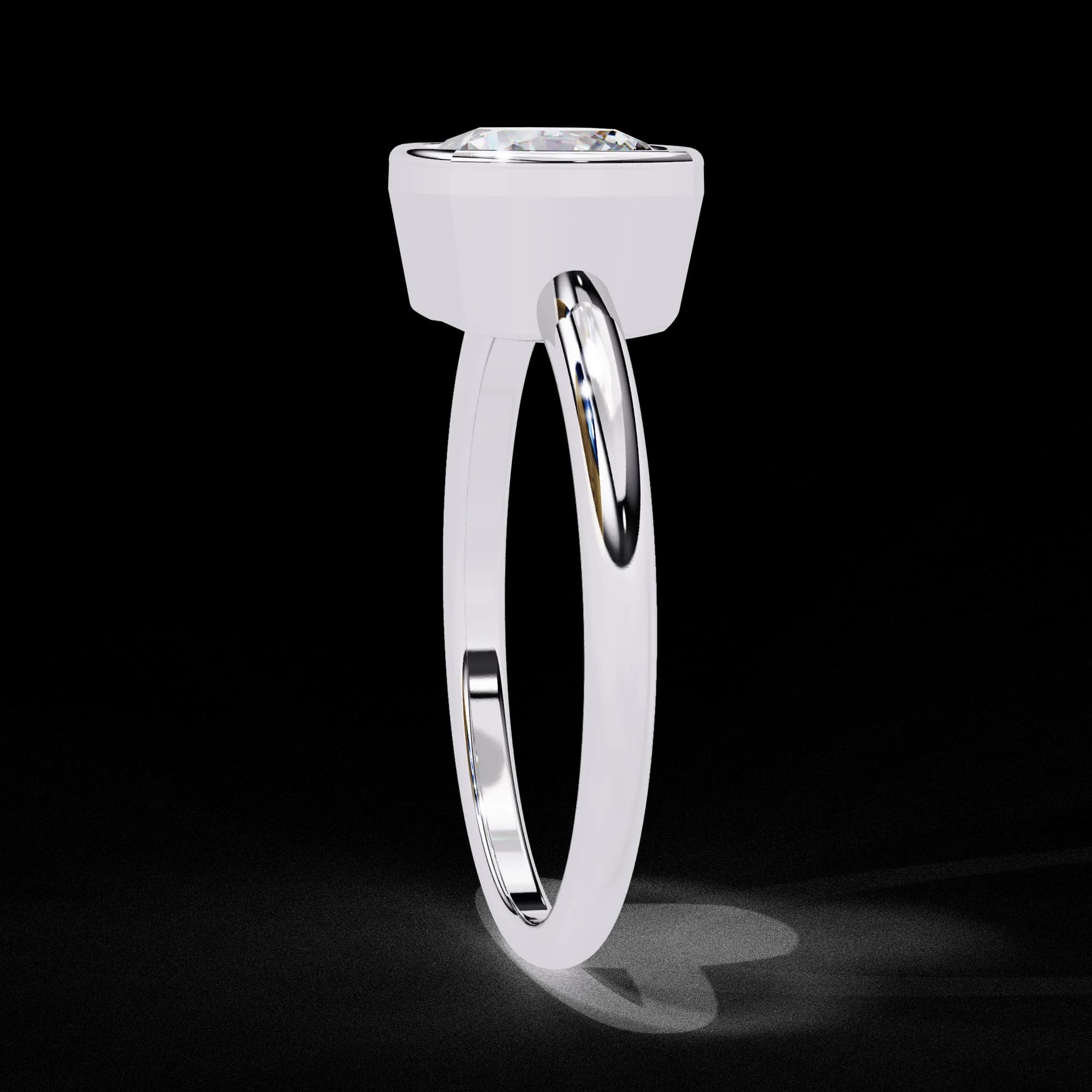 Cushion cut lab grown diamond bezel solitaire engagement ring in white gold, side profile view