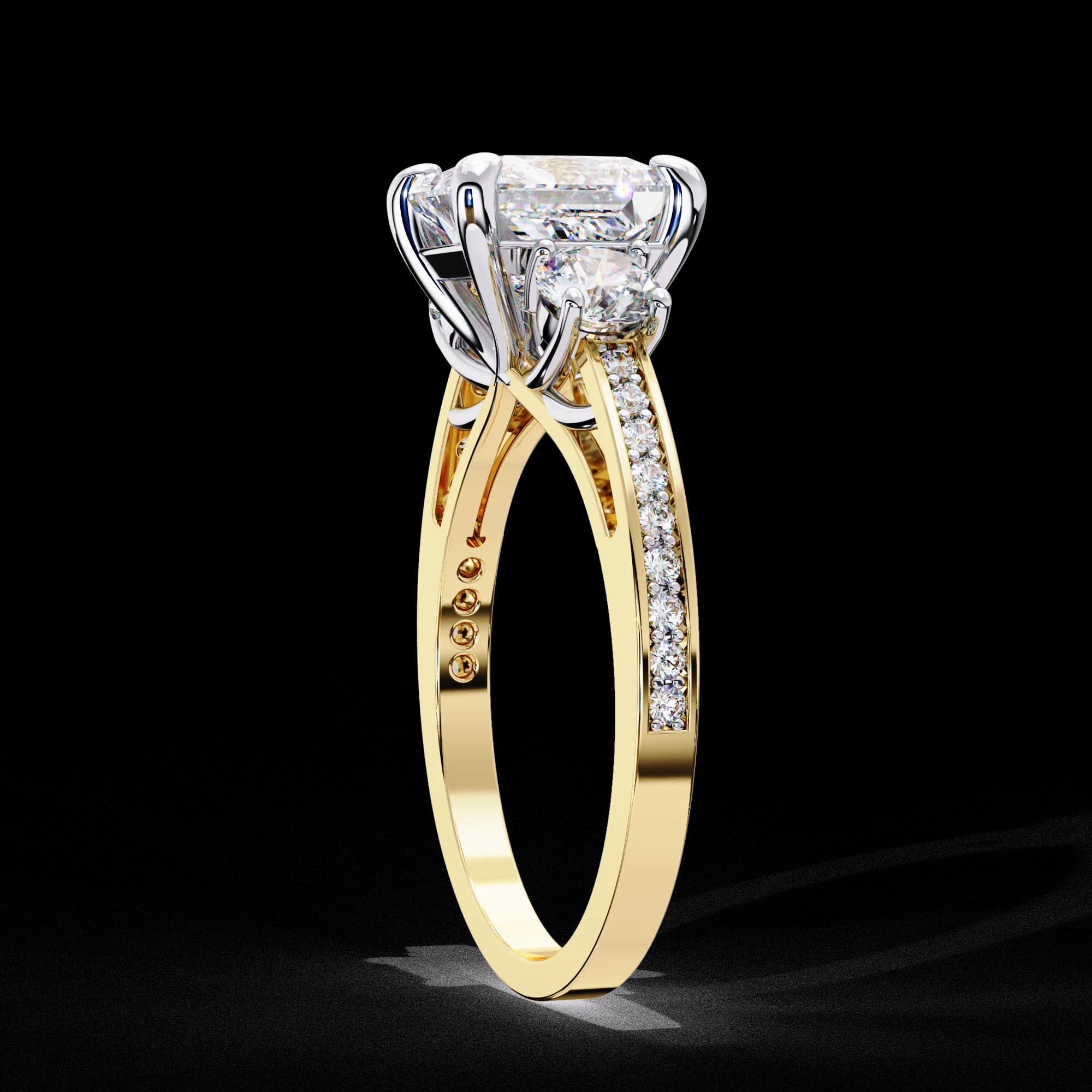 Princess cut lab grown diamond three-stone engagement ring in yellow gold, side profile view