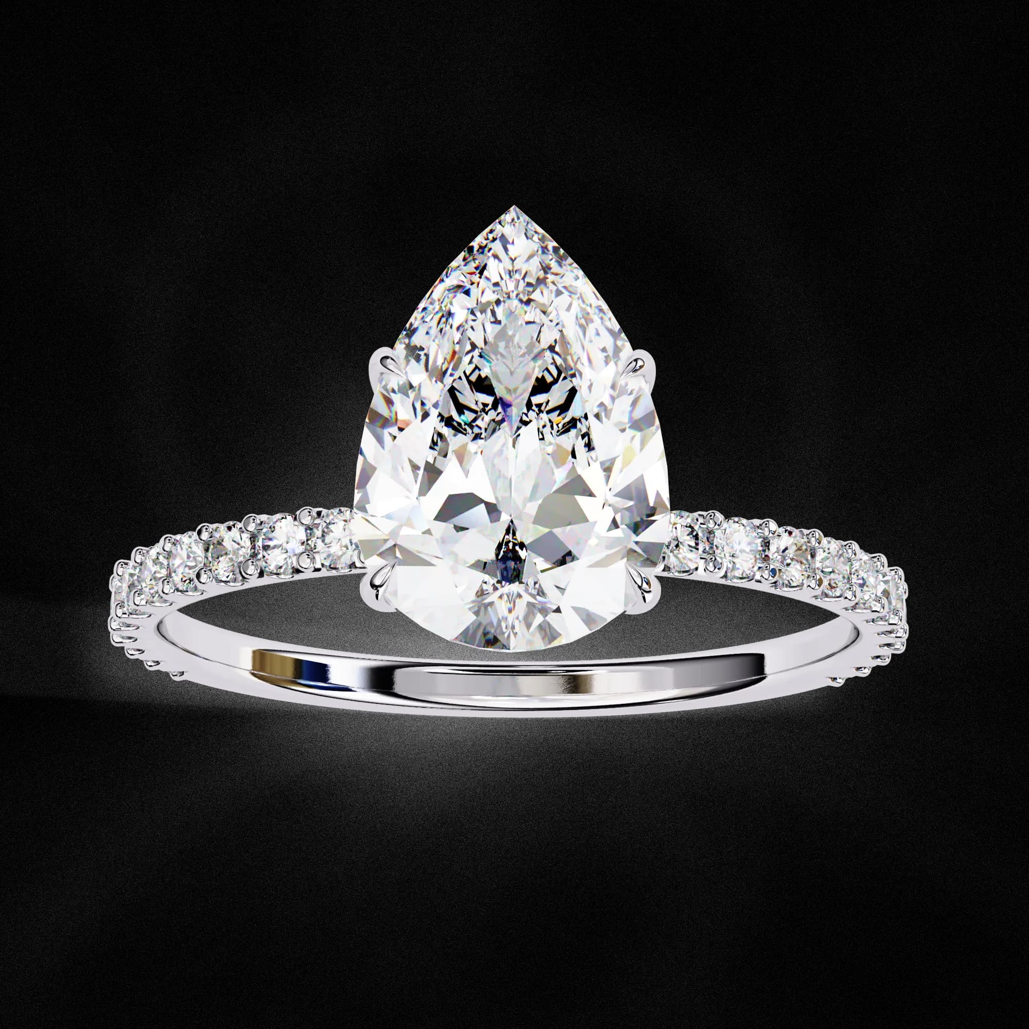 Pear cut lab grown diamond hidden halo pavé engagement ring in white gold, angled view