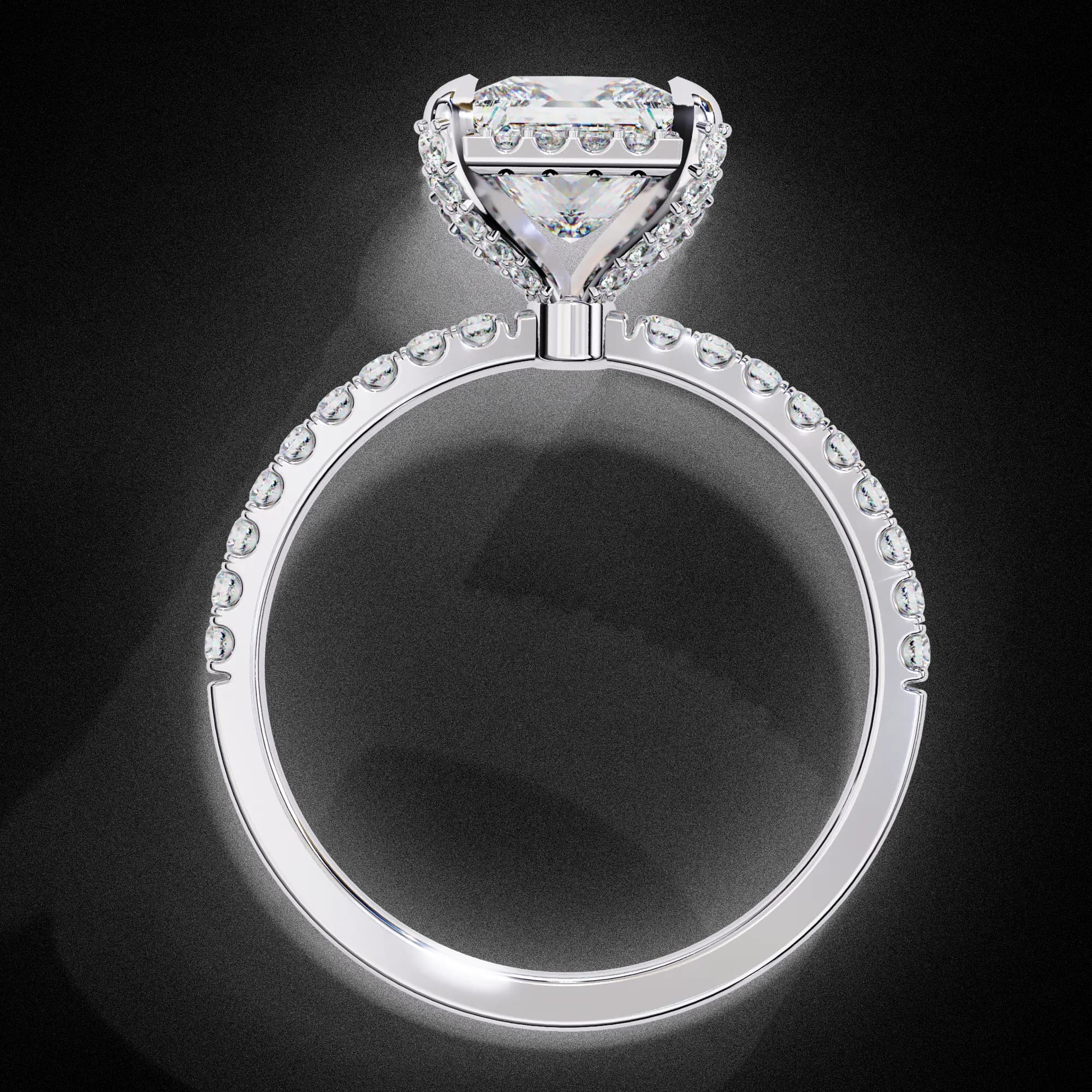 Princess cut lab grown diamond low halo engagement ring with pavé band in white gold, through-finger view