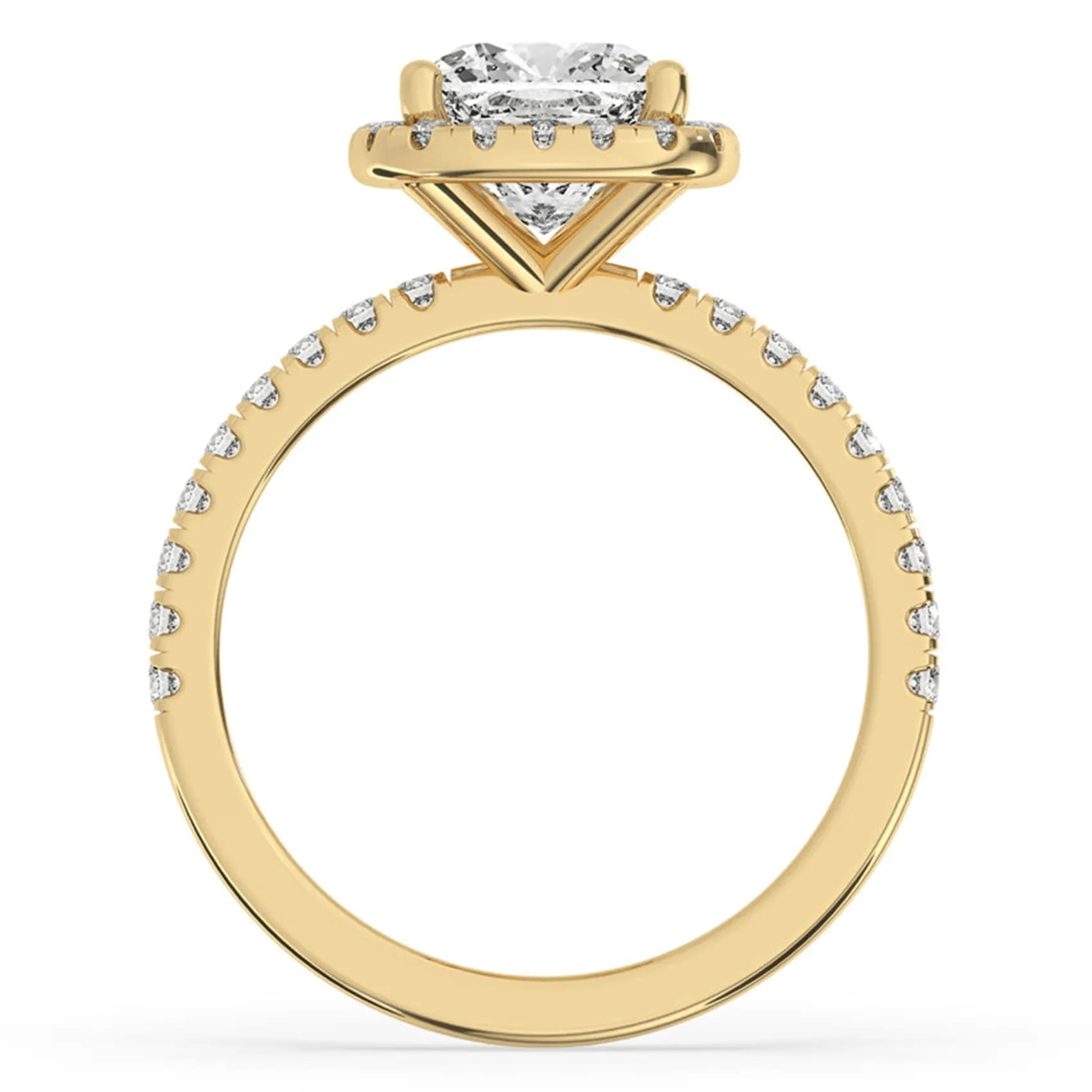 Through-finger view of the cushion halo engagement ring in yellow gold, showing the pavé-set shoulders