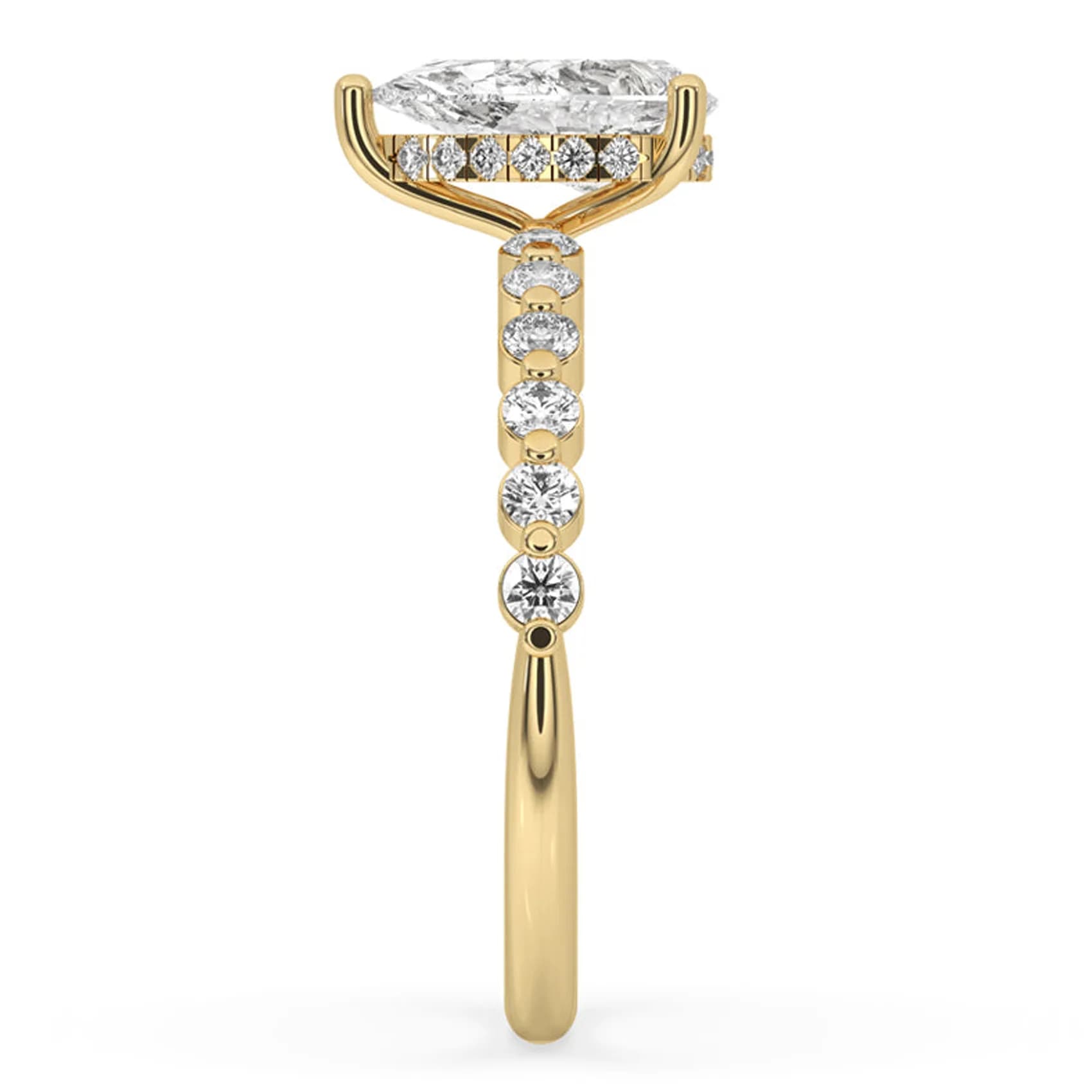 Side profile of the pear hidden halo ring in yellow gold, showing the hidden halo under the stone