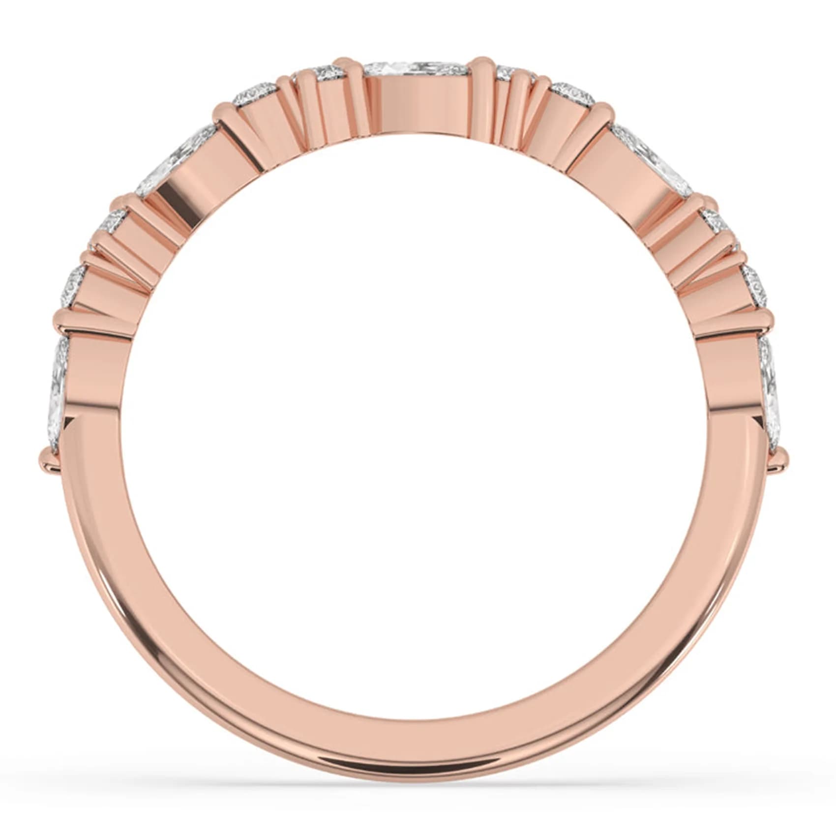Through-finger view of the half eternity band in rose gold
