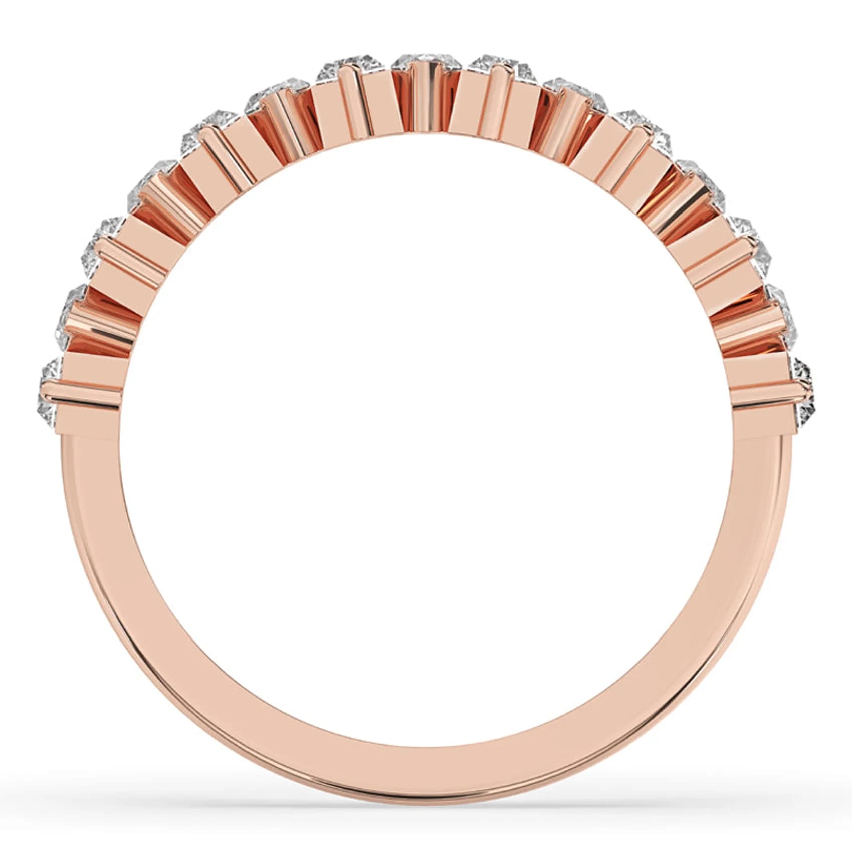 Through-finger view of the half eternity band in rose gold
