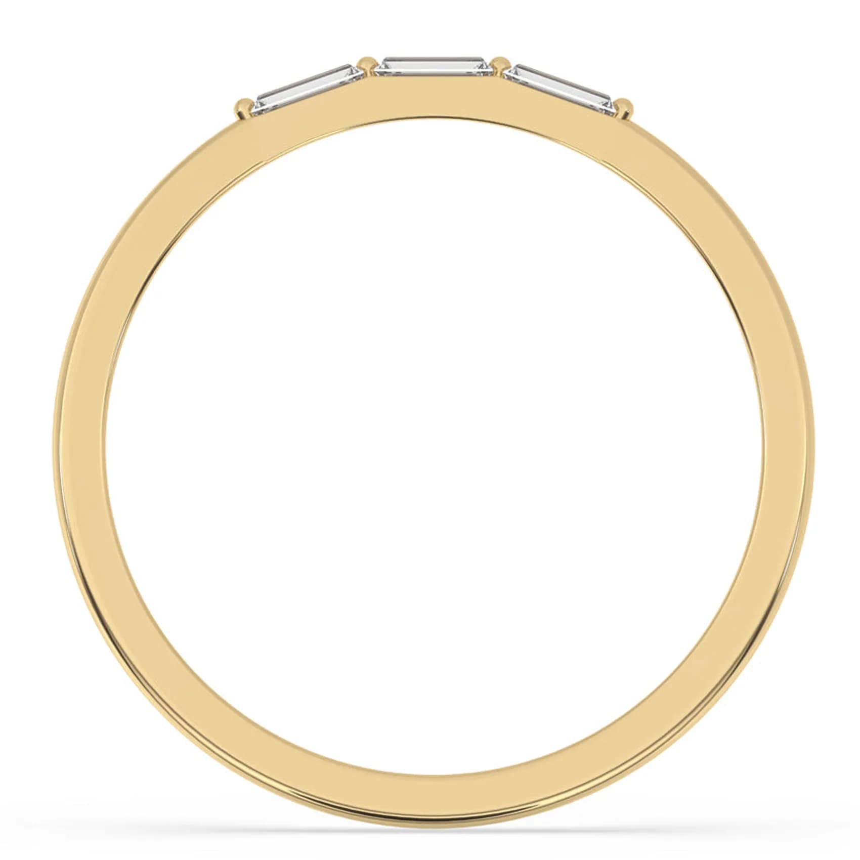 Through-finger view of the three stone baguette band in yellow gold