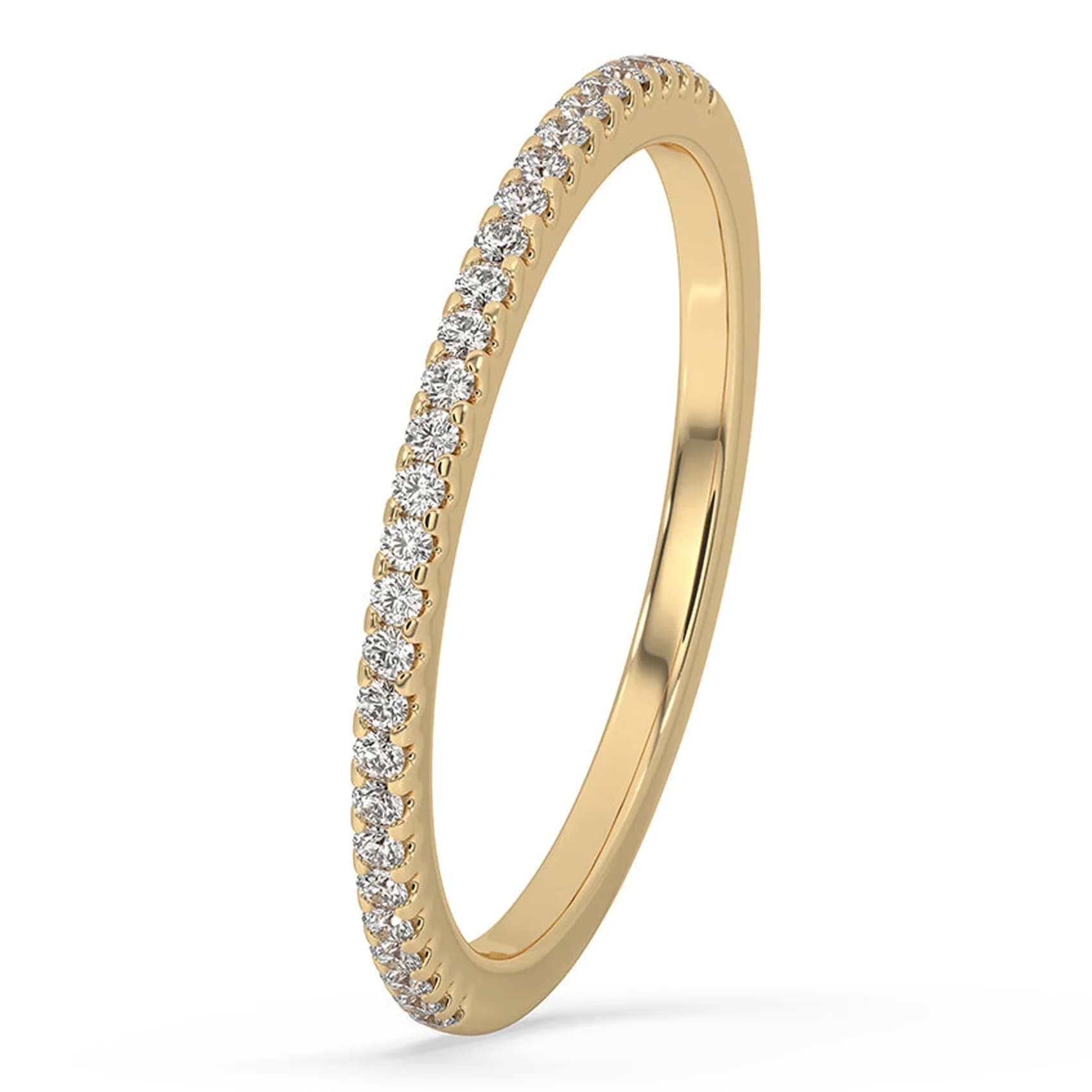 Angled view of the skinny micro pavé half eternity band in yellow gold