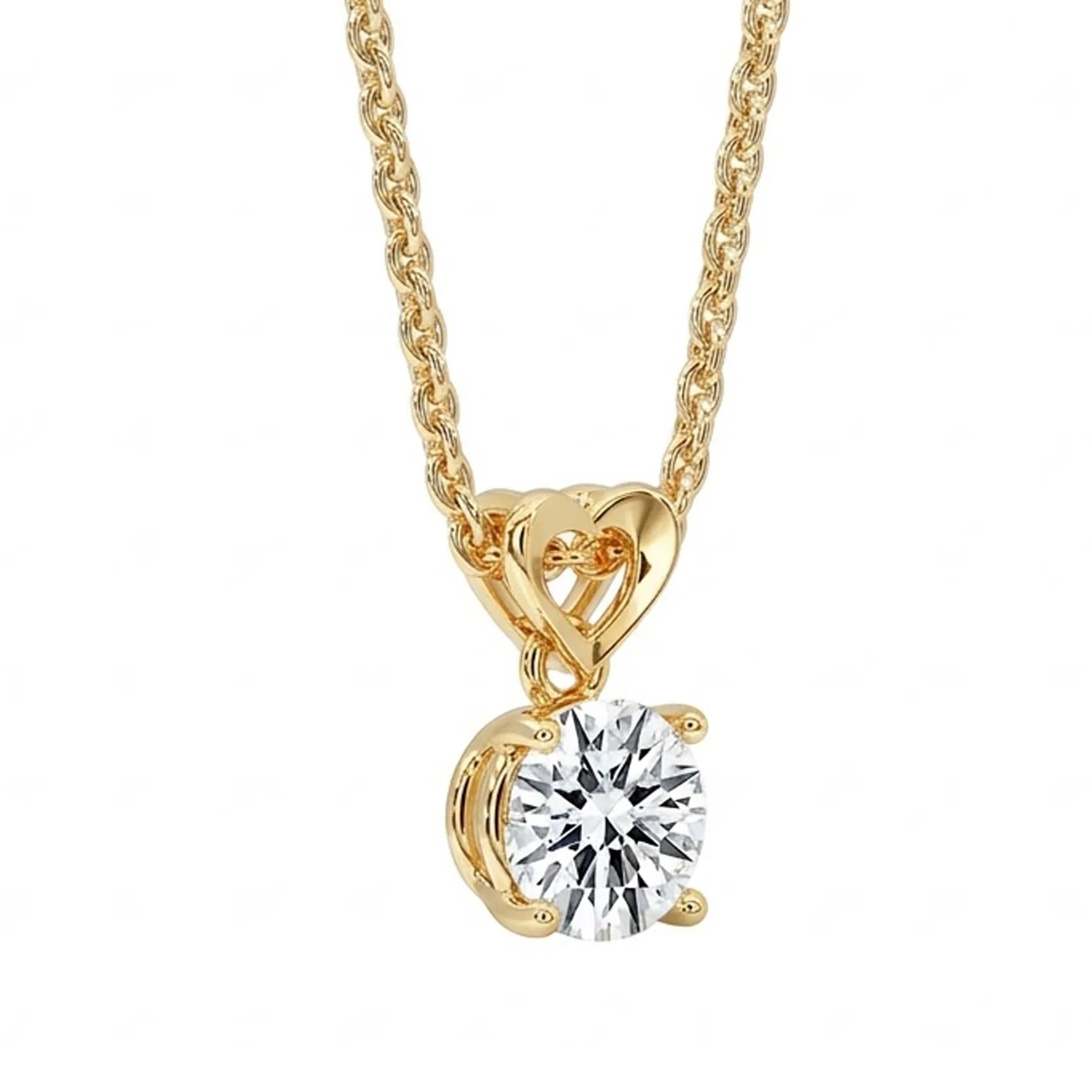 Angled view of the round lab grown diamond pendant with heart bail in yellow gold