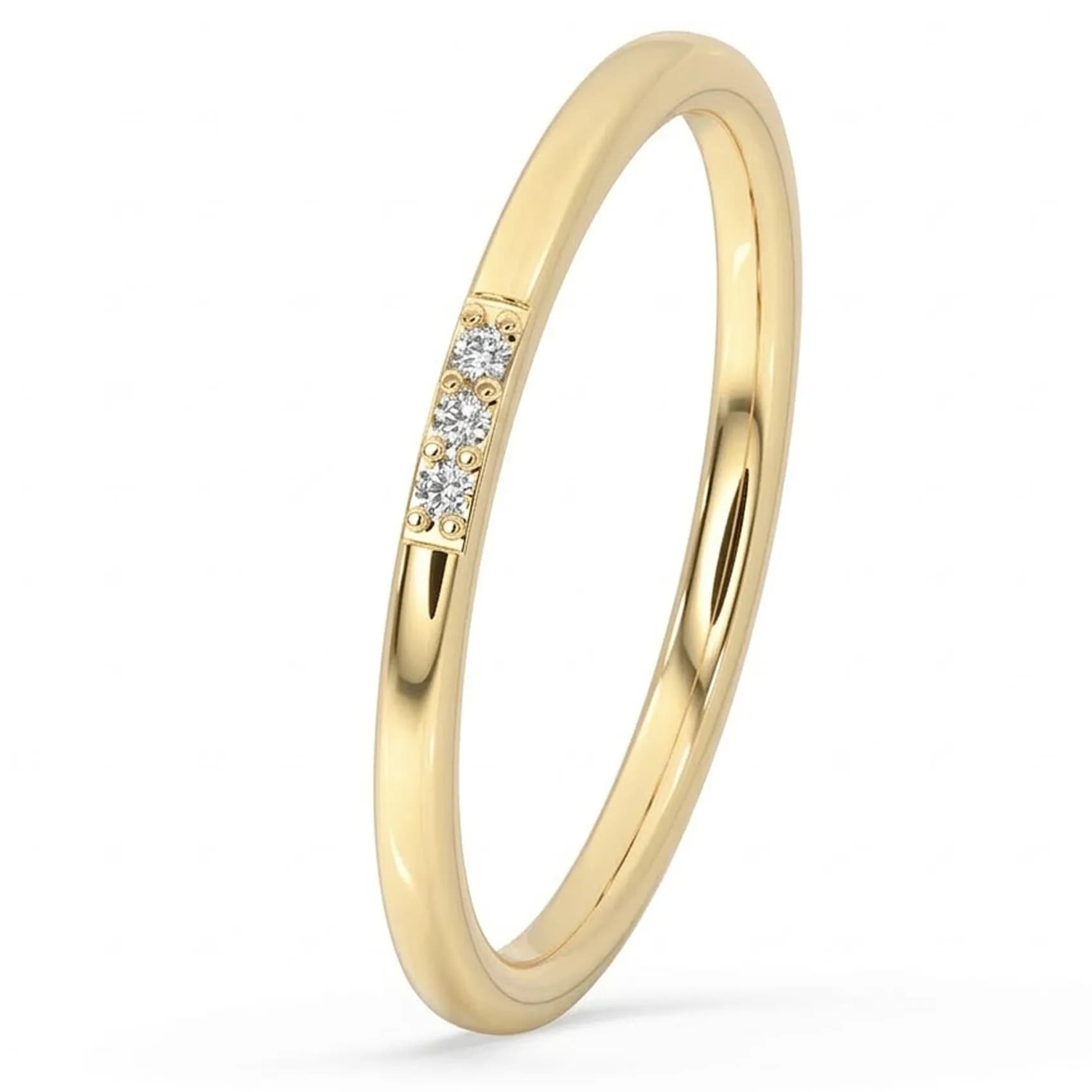 Angled view of the slim three stone diamond band in yellow gold