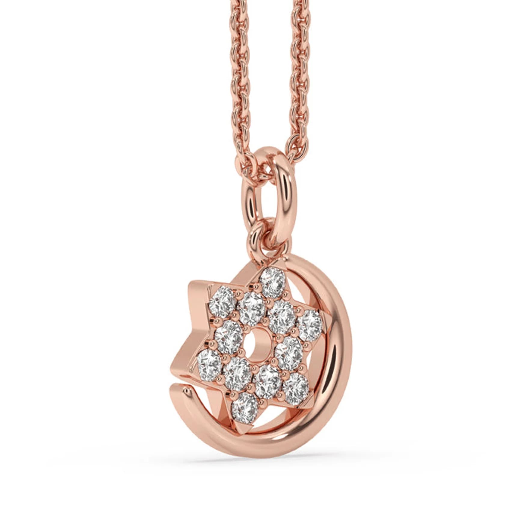 Angled view of the lab grown diamond star and crescent moon pendant in rose gold